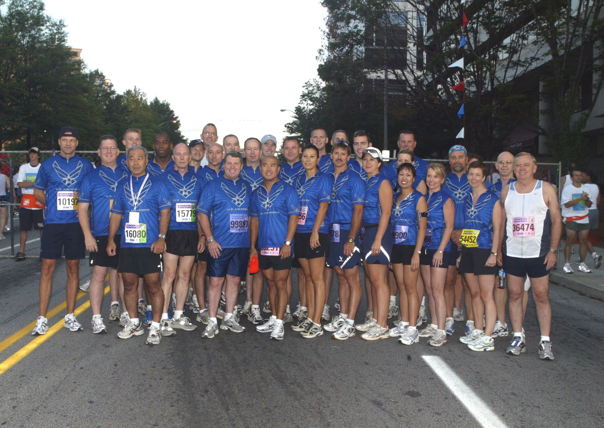 A contingent of Air Force members and volunteers from Dobbins Air Reserve Base, Ga., ran representing the Air Force in the annual Peachtree Road Race in downtown Atlanta July 4th. The event draws more than 75,000 applicants, 55,000 of whom are chosen to run. (U.S. Air Force photo/Don Peek)