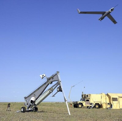 A Scan Eagle Unmanned Aerial System launches from a catapult. (U.S. Air Force photo)