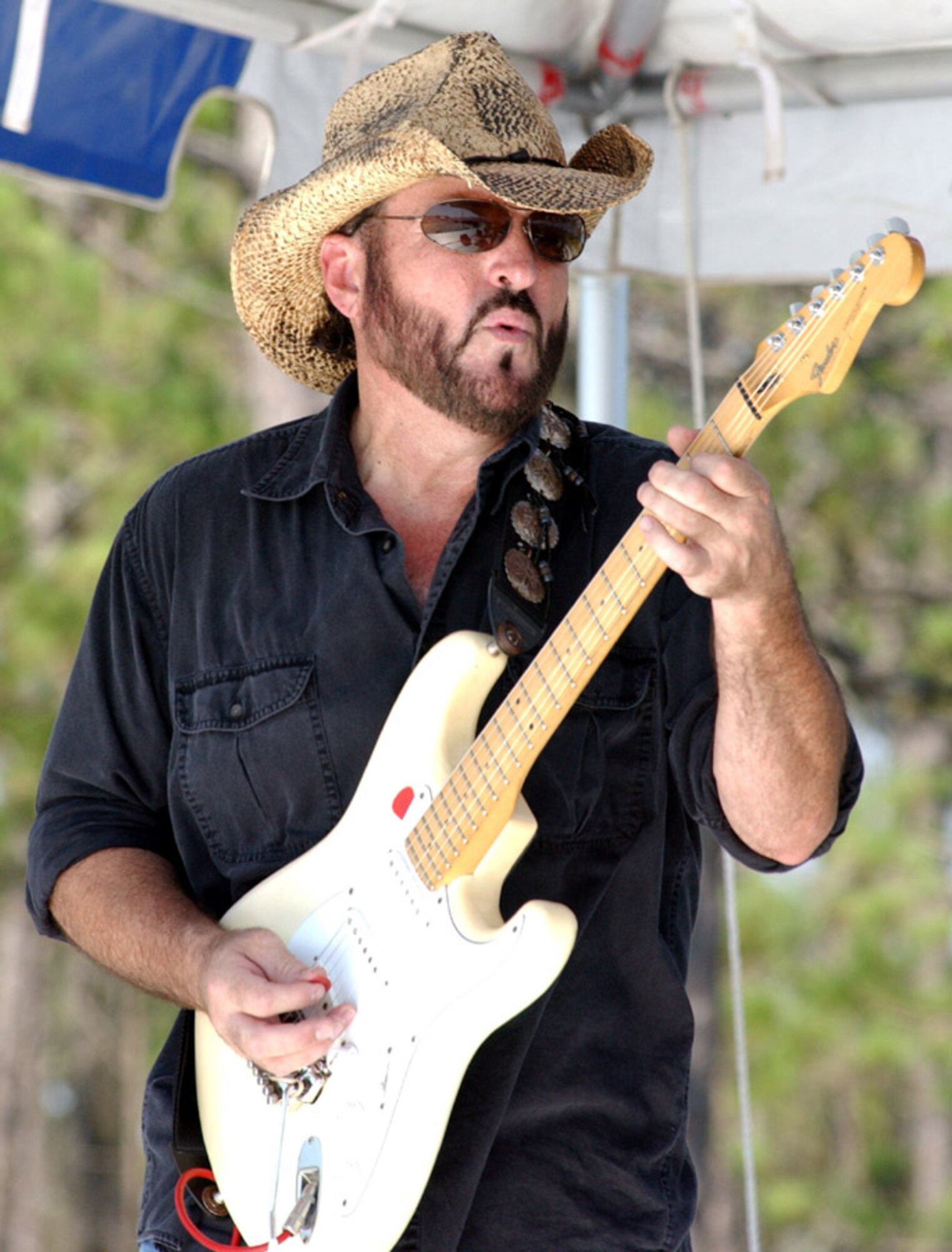 The guitarist from The Blackened Blues band rocks out during the 29th Annual Sound of Independence at the marina June 29. (U.S. Air Force photo/Tech. Sgt. Angela Shepherd)