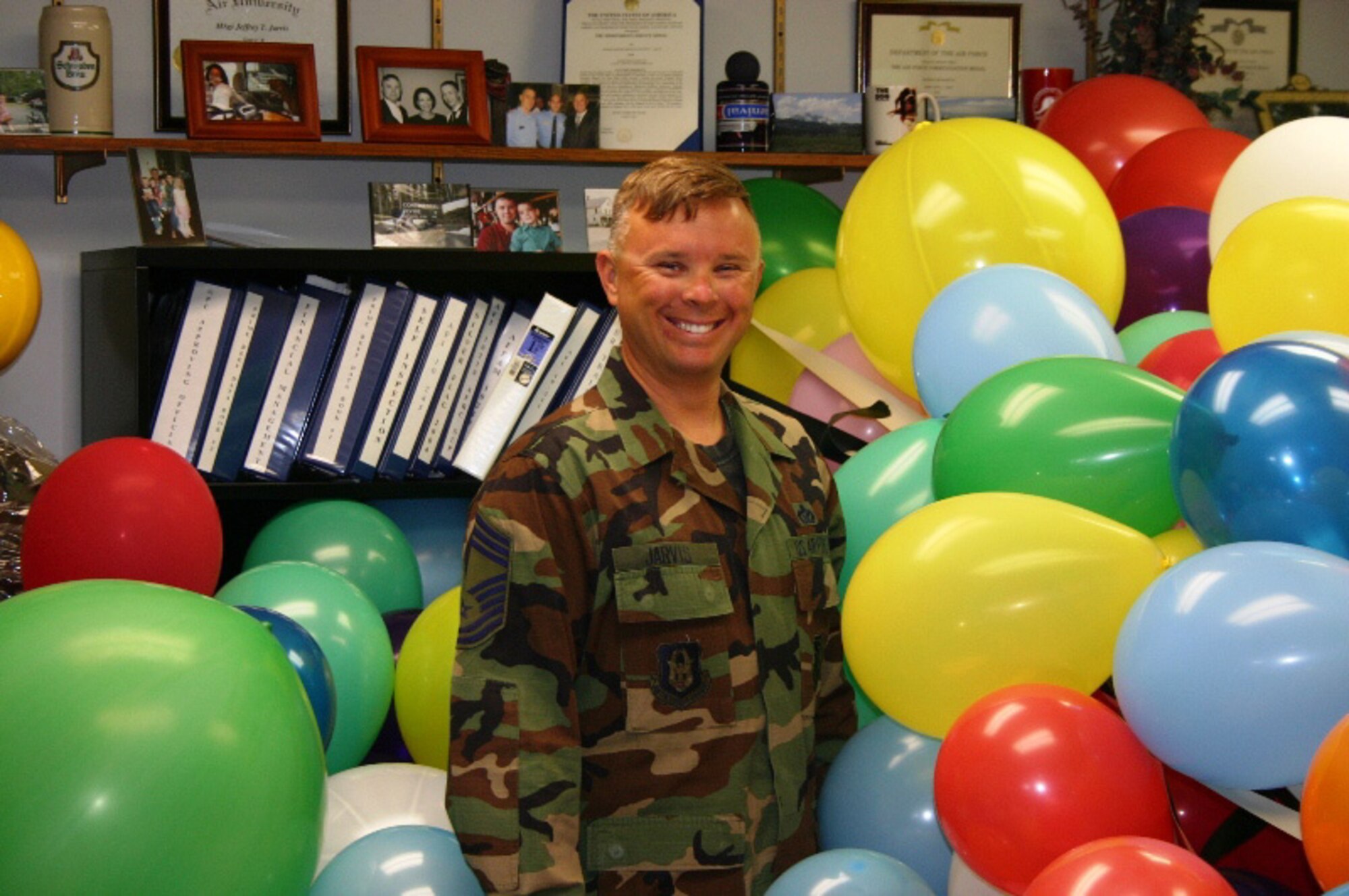 SEYMOUR JOHNSON AIR FORCE BASE--Newly promoted Chief Master Sgt. Jeff Jarvis was surprised in early June with an office full of balloons (and crickets) by his commander and fellow civil engineers.  Lt. Col. Kerri Grimes, commander of the 916th Civil Engineer Squadron, organized a surprise breakfast and promotion ceremony for Chief Jarvis. Chief Jarvis started with the 916th Air Refueling Wing, Air Force Reserve in 1992.