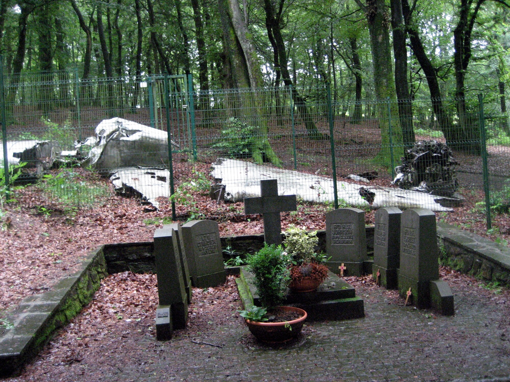 SPANGDAHLEM AIR BASE GERMANY -- A memorial on a hillside near the railway station at Maulusmillen, Germany, two kilometers from Huppderdang, pays tribute to three Belgian secret service agents and three British crew members from a Hudson IIIA light bomber that crashed March 20, 1945. Several people from Spangdahlem AB visited the site during a trip sponsored by the European Military History Group July 5, 2007. (U.S. Air Force photo/Staff Sgt. Andrea Knudson)