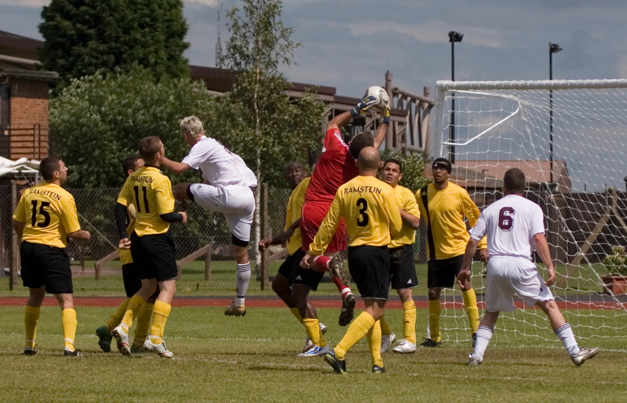Ramstein Rams' goalkeeper catches the ball from a cross in the USAFE soccer championship game. (U.S. Air Force photo by Master Sgt. Jeffrey Waits)