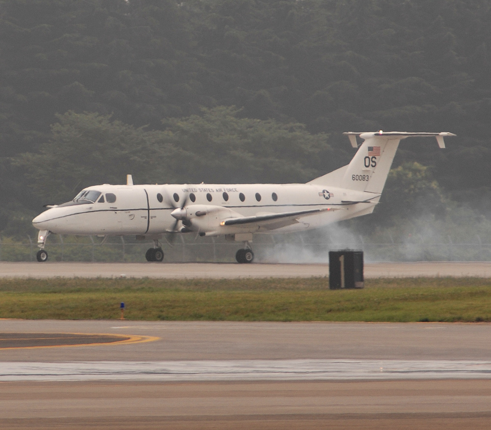 The first C-12 Huron lands at Yokota Air Base, Japan. The C-12 will replace Yokota's recently departed fleet of C-21 learjets. (U.S. Air Force Photo by A1C Laszlo Babocsi)(Released)