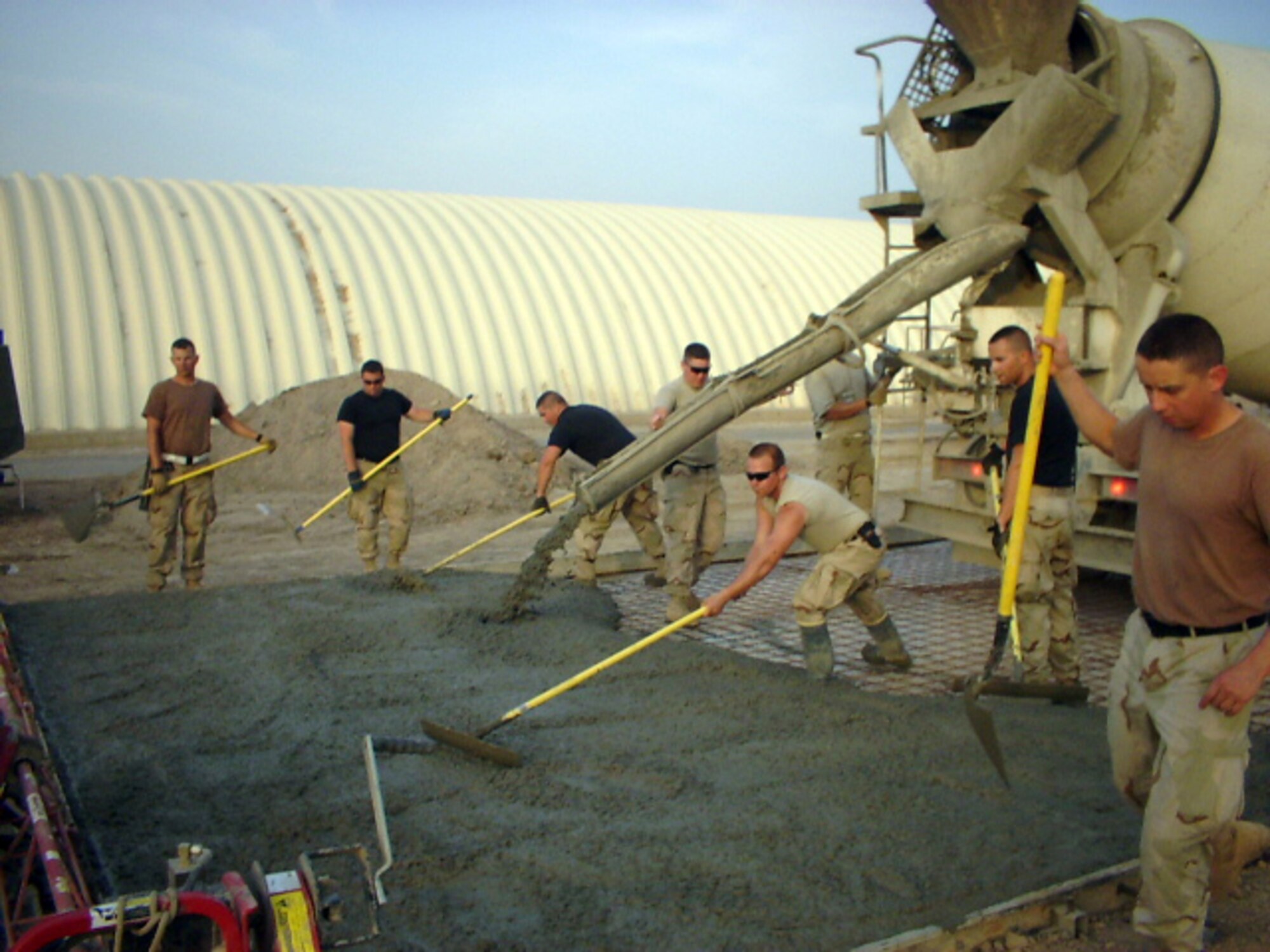Airmen from the 1st Rapid Engineer Deployable Heavy Operational Repair Engineer Group work on a concrete operation at a forward-deployed location in the AOR. (U.S Air Force photo)