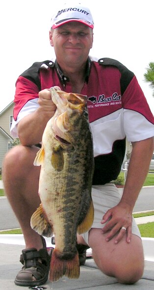 Master Sgt. Randy Cnota, 347th Operations Support Squadron, shows off a 10-pound bass he recently caught from Banks Lake near Lakeland, Ga. Sergeant Cnota is scheduled to participate in a national angling competition in early 2008. (Courtesy photo)
