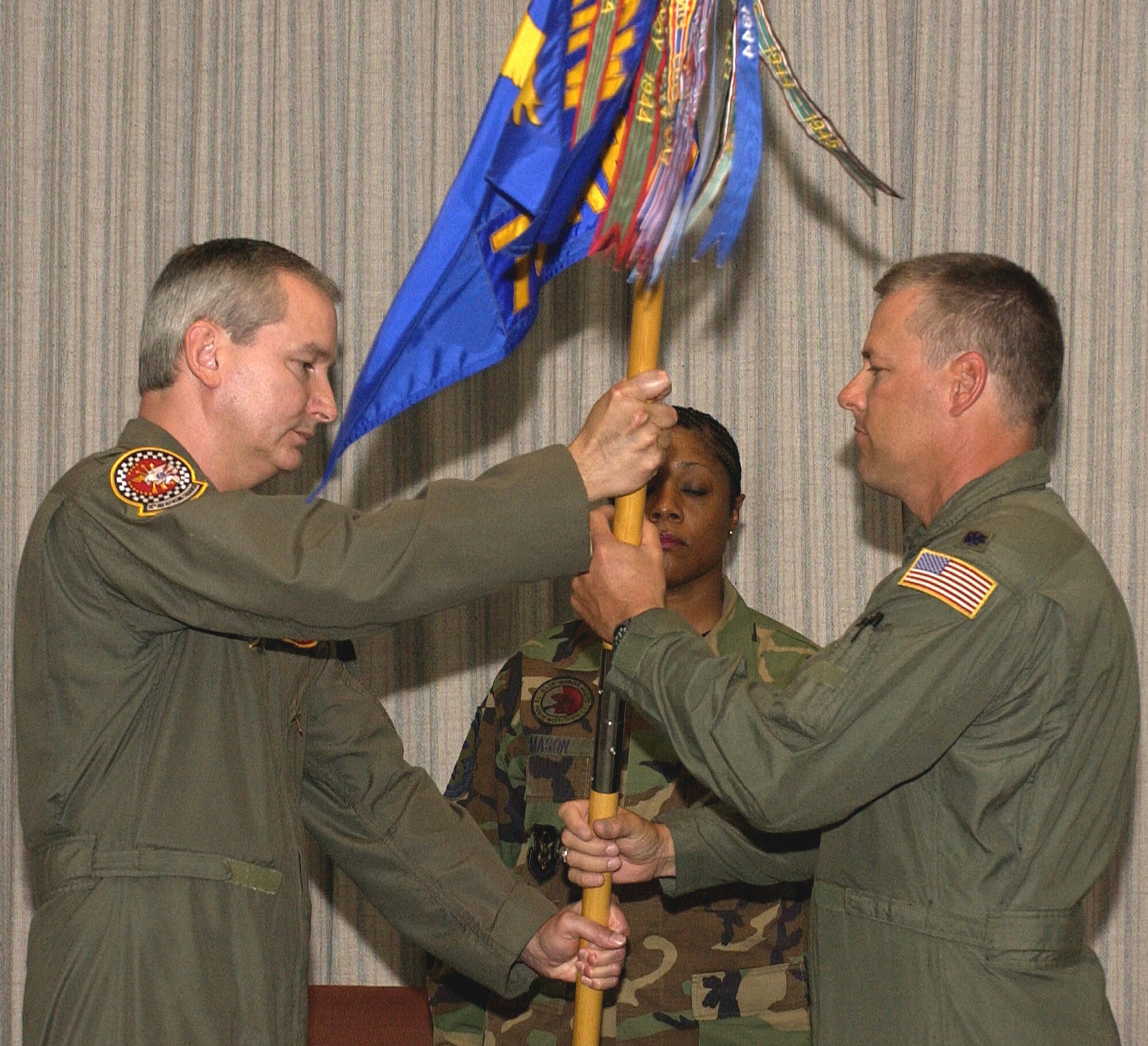GRISSOM AIR RESERVE BASE, Ind., -- Lt. Col. Paul Wietbrock  (right) receives the 74th Air Refueling Squadron flag from Col. Fritz Linsenmeyer, 434th Operations Group Commander, during a change of command ceremony held here July 8. Colonel Wietbrock assumes command from Col. Tim Cox, who was named the 434th Air Refueling Wing vice commander. "It is an honor and privilege to be the 74th Air Refueling Squadron commander," Colonel Wietbrock said. "The people of the 74th (ARS) are its strength; there are none better. I am confident we can overcome any challenges ahead with outstanding results."  (U.S. Air Force Photo/Tech. Sgt. Pat Kuminecz)