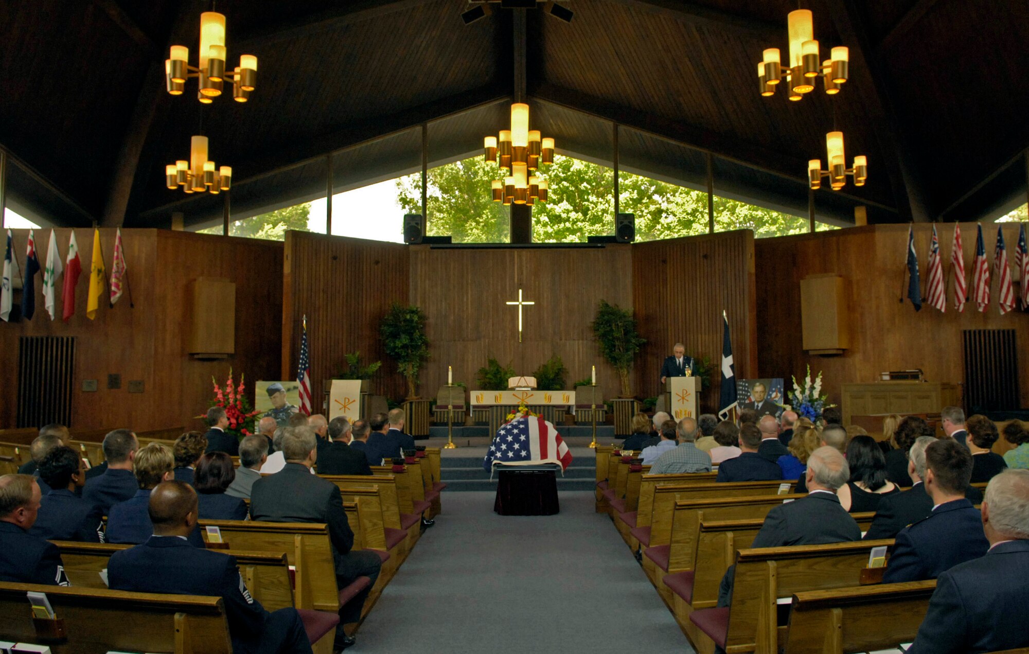 Chaplain (Col.) Charlie Stutts officiates the full honors funeral of former Chief Master Sergeant of the Air Force Gary R. Pfingston July 6 at Arlington National Cemetery, Va. The 10th CMSAF was born in Evansville, Ind., and entered the Air Force in February 1962. He passed away June 23 in San Antonio. (U.S. Air Force photo/Senior Airman Rusti Caraker)