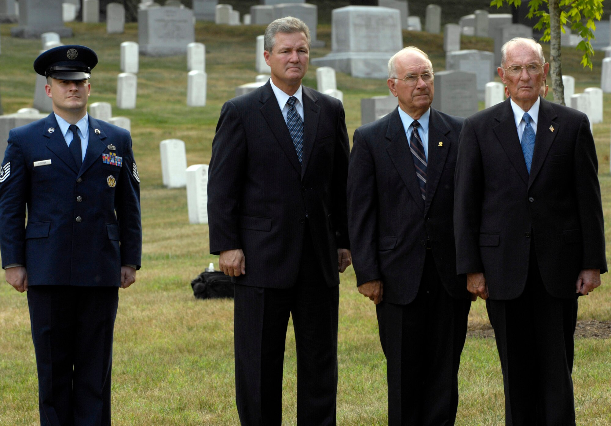 Retired Chief Master Sergeants of the Air Force pay their respects to former CMSAF Gary R. Pfingston at his burial site July 6 at Arlington National Cemetery, Va.  The 10th CMSAF was born in Evansville, Ind., and entered the Air Force in February 1962. He passed away June 23 in San Antonio. (U.S. Air Force photo/Senior Airman Rusti Caraker)