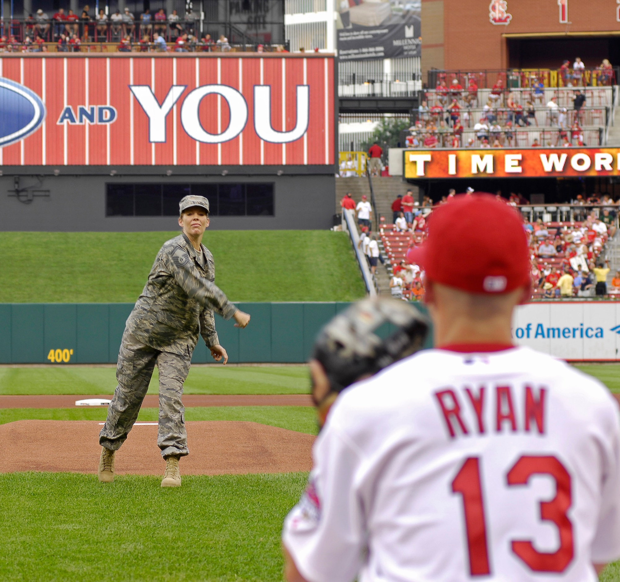 Senior Master Sgt. Letitia Whitaker throws out the first pitch at the St Louis Cardinals-San Francisco Giants baseball game July 7. She was selected to make the pitch as part of Air Force Week St. Louis.  Sergeant Whitaker, a Bronze Star medal recipient, is a member of the Missouri Air National Guard. (U.S. Air Force photo/Staff Sgt. Brian Ferguson)