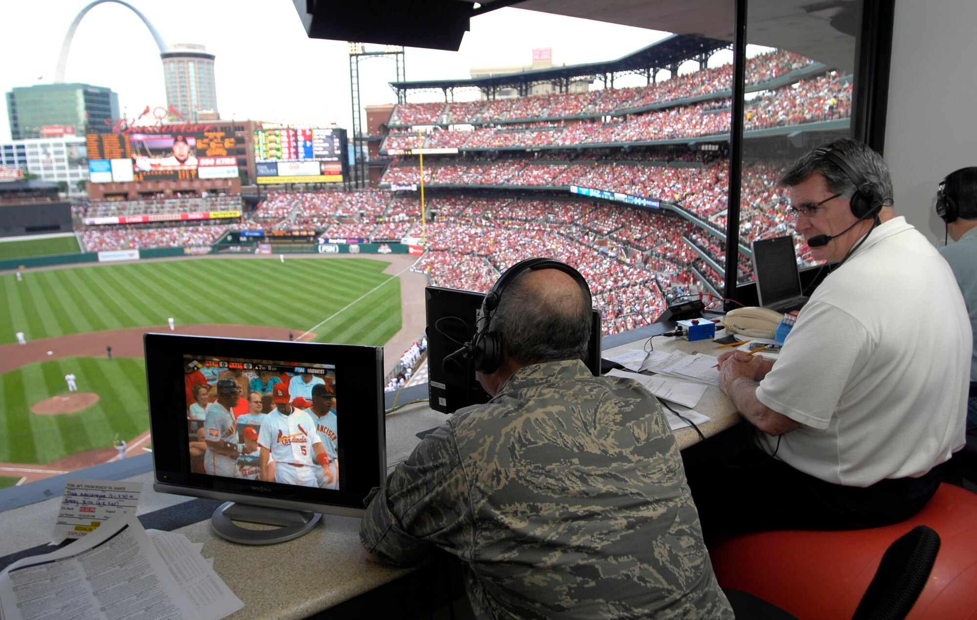 Gen. Duncan J. McNabb, Air Mobility Command commander at nearby Scott Air Force Base, Ill, talks with Mike Shannon, voice of the St. Louis Cardinals, during the Cardinals- Giants baseball game July 7.  The general had participated in several pregame events that were part of Air Force Week St. Louis.  (U.S. Air Force photo/Staff Sgt. Brian Ferguson)