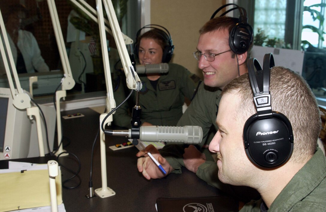 20th Expeditionary Bomber Squadron Airmen discuss the B-52 Stratofortress and the bomber presence in the Pacific region during a visit to K-57 news talk radio recently. (U.S. Air Force Photo by Master Sgt. Art Webb)