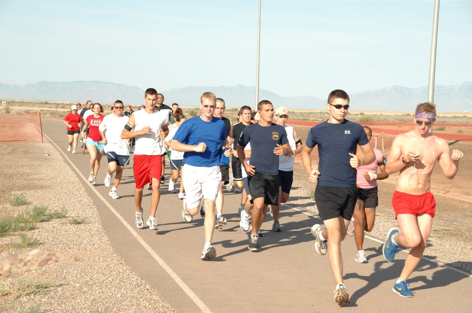 Members of the 49th Fighter Wing participate in a fun run July 3 as part of the Freedom Fest Independence Day celebration. (U.S. Air Force photo by Airman 1st Class Jamal Sutter)

