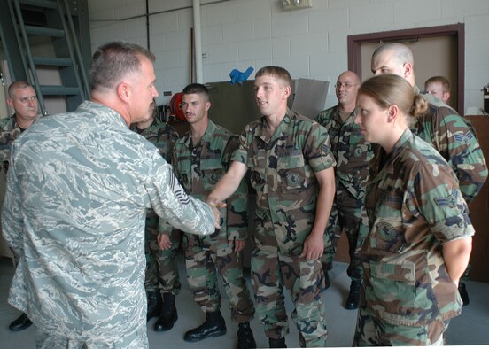 Chief Master Sgt. Troy McIntosh, Air Force Reserve Command command chief, meets 917th Munitions Flight members during his visit to the 917th Wing July 6-8. (U.S. Air Force photo/Staff Sgt. Chad Smith)