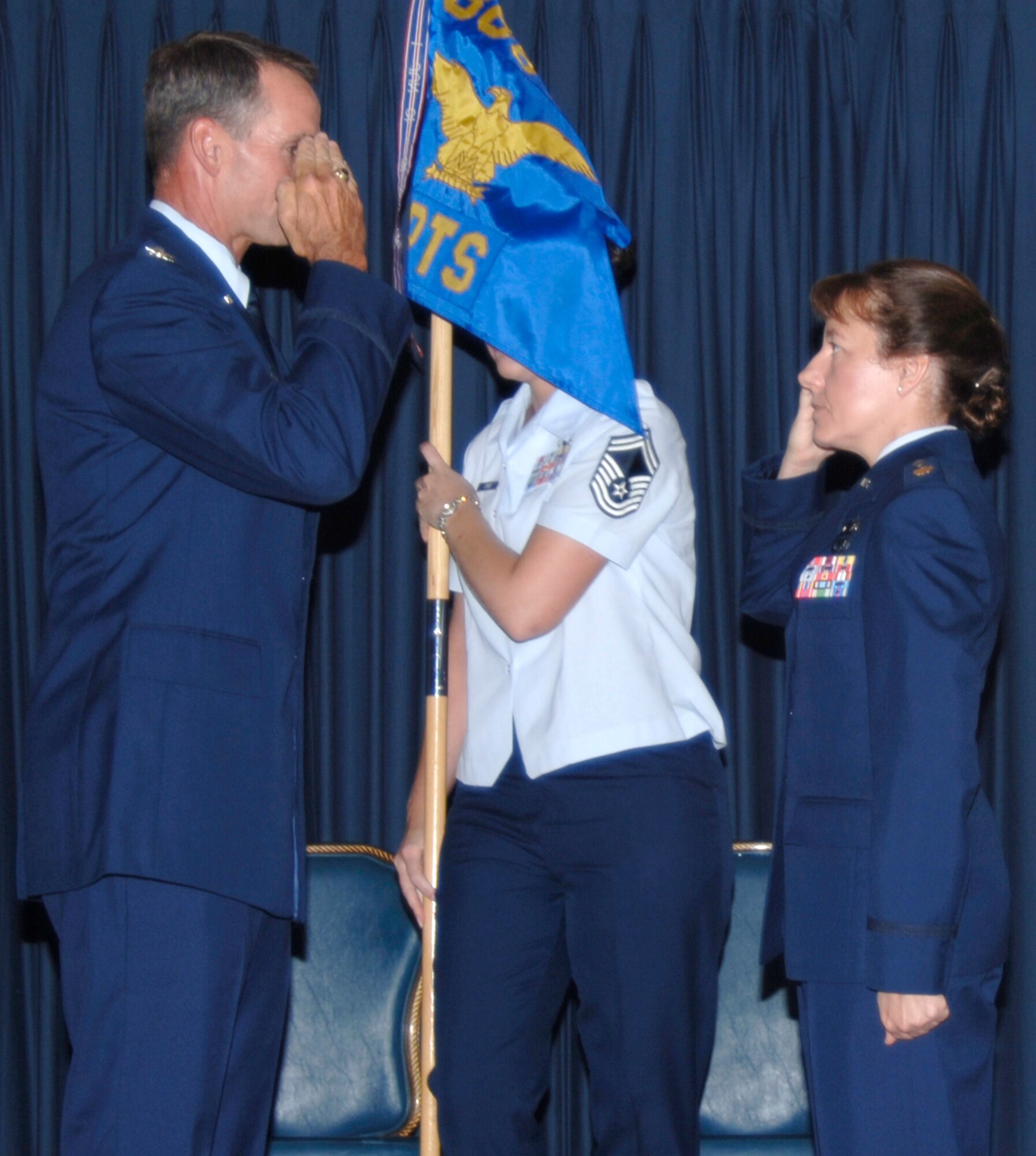 MOUNTAIN HOME AIR FORCE BASE, Idaho -- Maj. Terri Jones salutes Col. Tony Rock, 366th Fighter Wing commander, after she accepted command of the 366th Comptroller Squadron during a change of command ceremony here July 9. Major Jones came to Mountain Home after graduating from the Air Command and Staff College at Maxwell Air Force Base, Ala. The squadron’s outgoing commander, Maj. David Vaclavik, left the base to attend this intermediate officer development course. (Air Force photo/Airman 1st Class Stephany Miller)