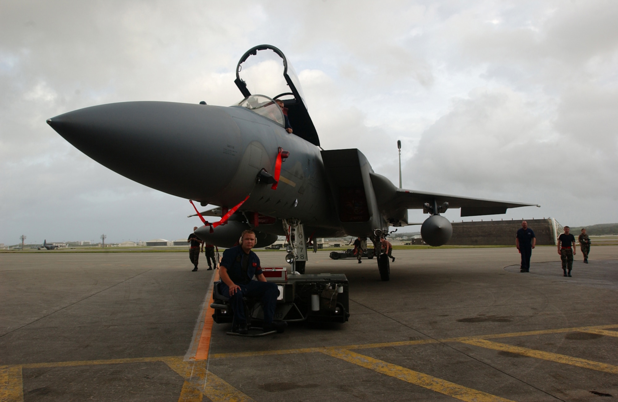 An F-15C Eagle is towed safely to a protective aircraft shelter in preparation for Typhoon Man-Yi on Kadena Air Base, Japan, July 12, 2007. The 44th and 67th Aircraft Maintenance Units are working together to have all fighter aircraft stored before the storm arrives.  This is the first typhoon of the year for Okinawa.  U.S. Air Force photo/Staff Sgt. Reynaldo Ramon