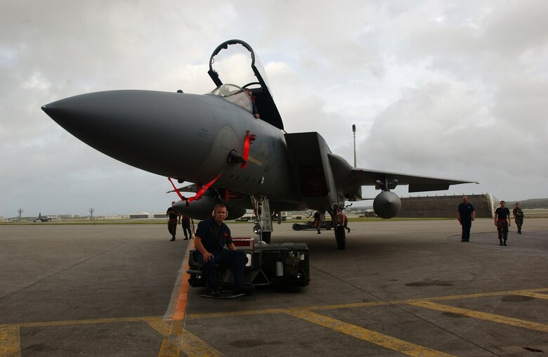 An F-15C Eagle is towed safely to a protective aircraft shelter in preparation for Typhoon Man-Yi on Kadena Air Base, Japan, July 12, 2007. The 44th and 67th Aircraft Maintenance Units are working together to have all fighter aircraft stored before the storm arrives.  This is the first typhoon of the year for Okinawa.  U.S. Air Force photo/Staff Sgt. Reynaldo Ramon