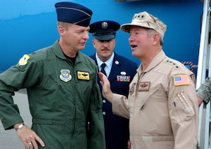 Col. John "Red" Millander, 437th Airlift Wing commander, welcomes Gen. Duncan McNabb, Air Mobility Command commander, Sunday before the generals trip to Rota, Spain.(U.S. Air Force photo/ Maj. Bill Walsh)