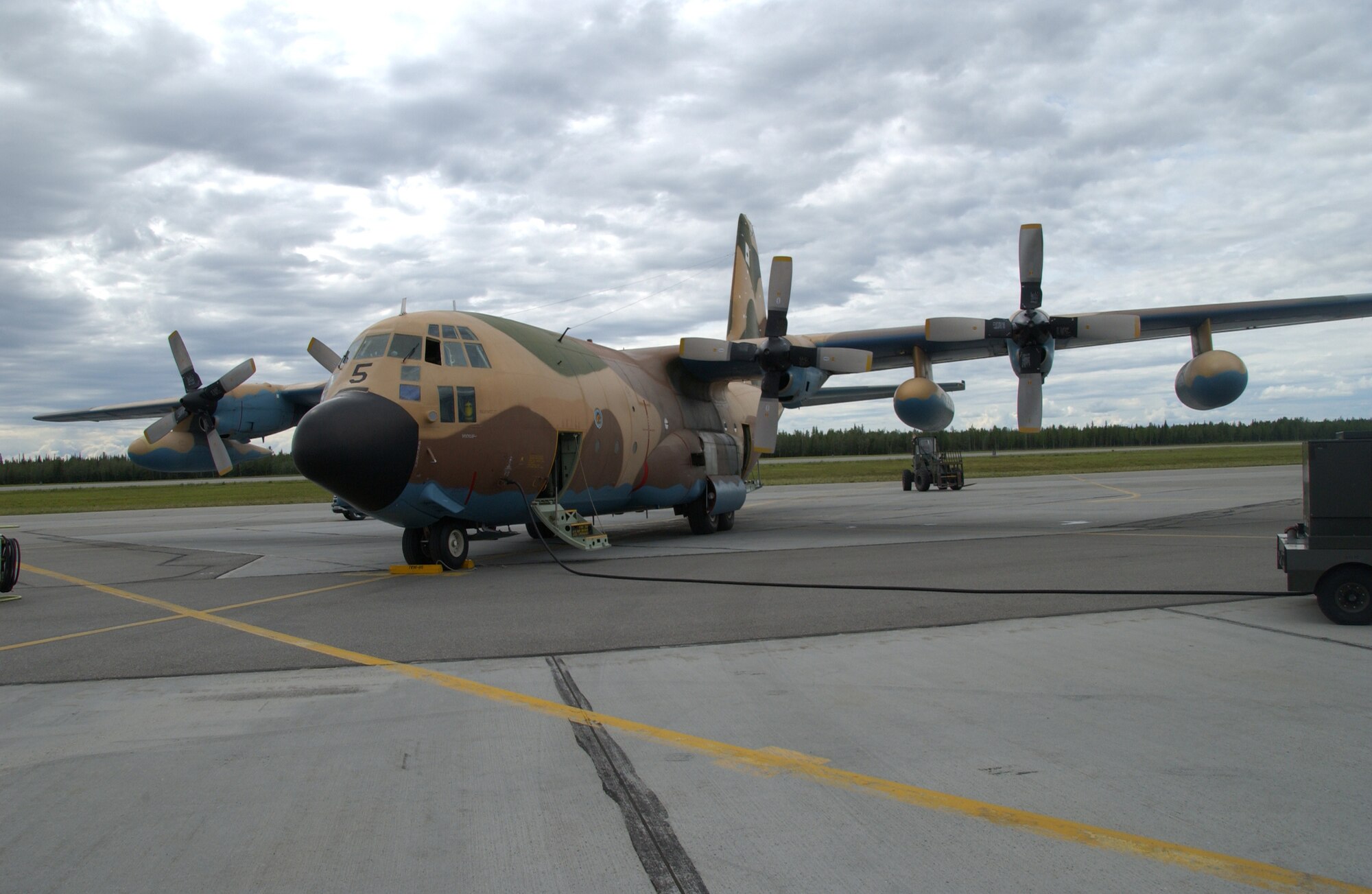 EIELSON AIR FORCE BASE, Alaska -- A Spanish Air Force C-130 parks on the Eielson AFB flight line to unload cargo for their stay during Red Flag-Alaska 07-3 July10, 2007. These exercises are conducted on the Pacific Alaskan Range Complex with air operations flown out of Eielson and Elmendorf Air Force bases in Alaska. (U.S. Air Force photo by Airman 1st Class Christopher Griffin) 