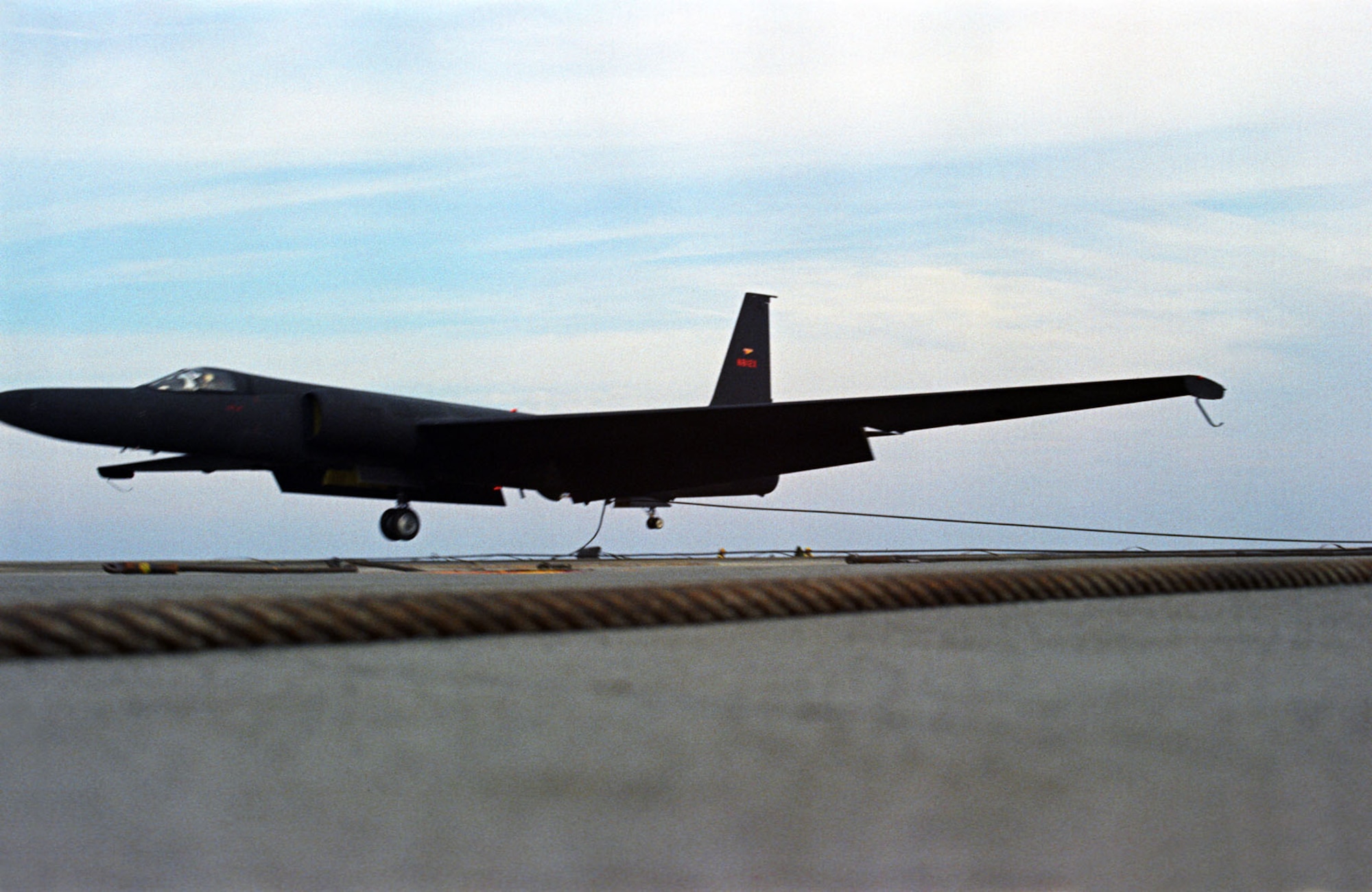 The U-2 was studied for use aboard aircraft carriers to extend its range, but this idea was not used operationally. Here, a U-2 lands on a carrier using an arresting hook. (U.S. Air Force photo)