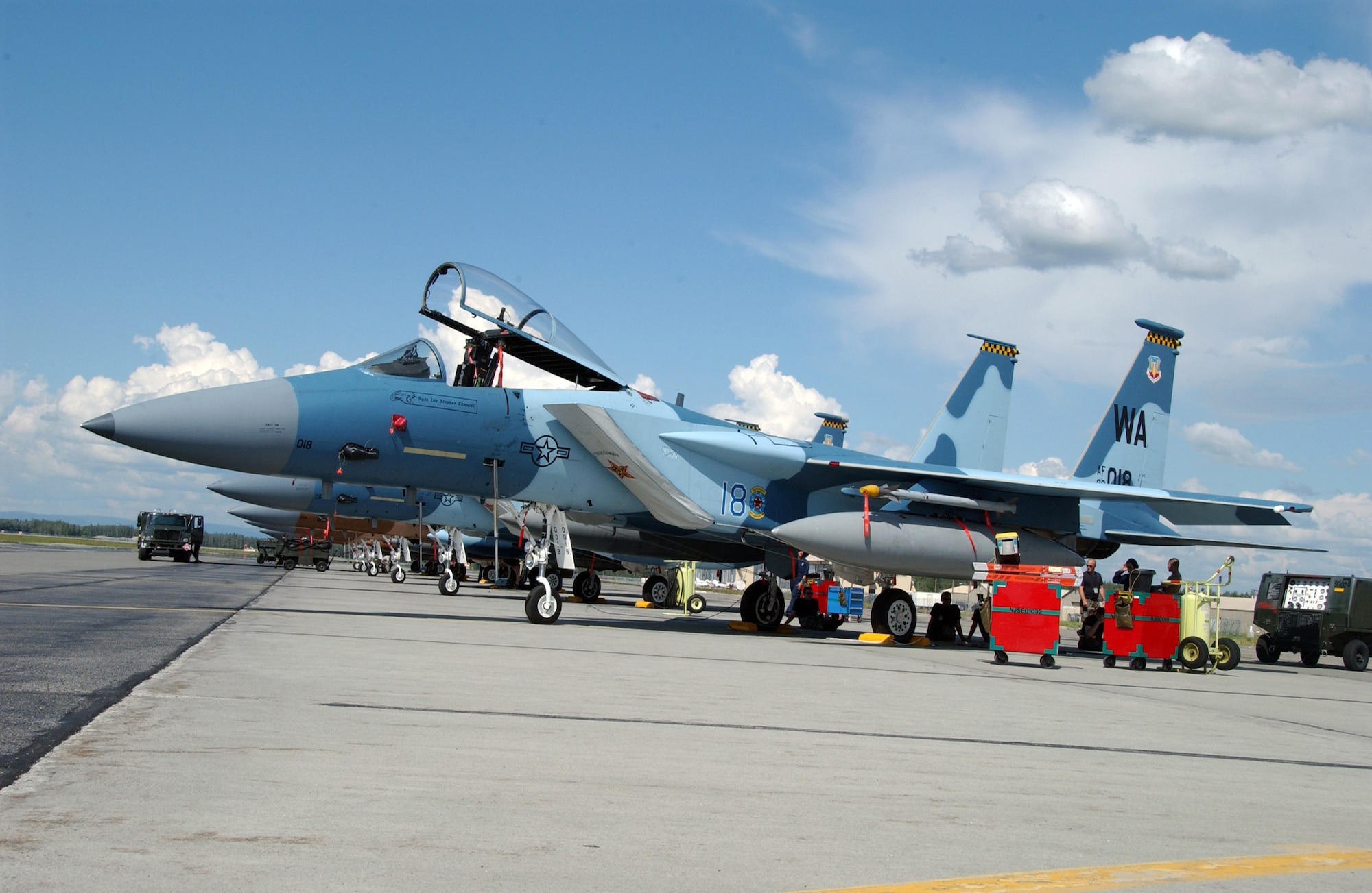 An F-15 Eagle from the 65th Aggressor Squadron at Nellis Air Force Base, Nev., sits parked on the Eielson AFB, Alaska, flight line July 9.  The 65th AGS is taking part in Red Flag-Alaska 07-3, a multi-service, multi-platform coordinated, combat operations exercise, which runs through the July 27. (U.S. Air Force photo/Airman 1st Class Christopher Griffin) 