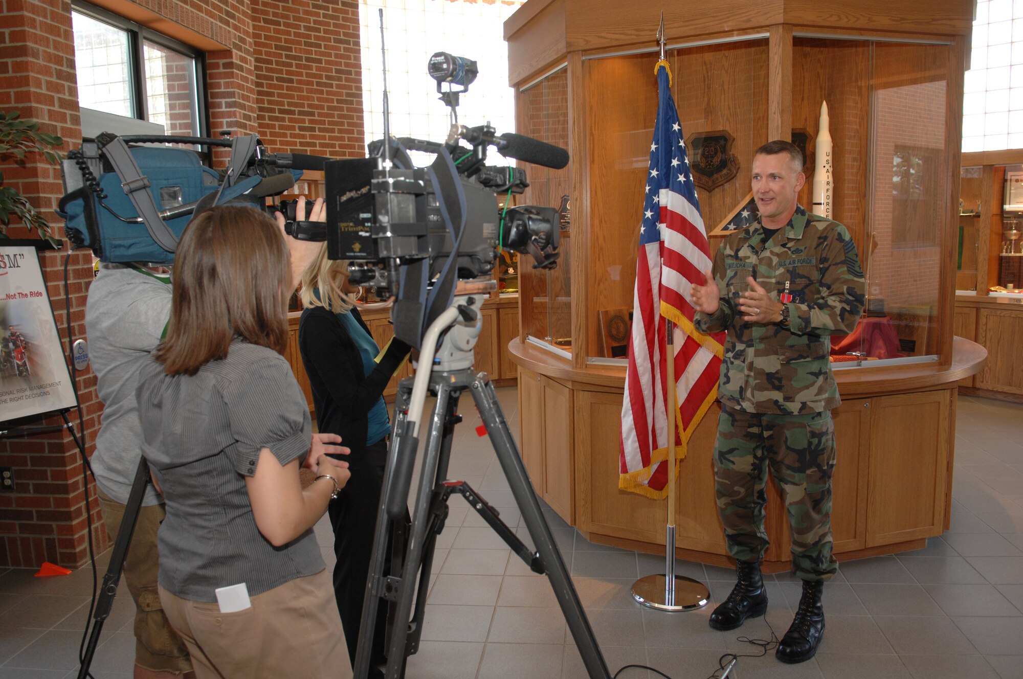 MINOT AIR FORCE BASE, N.D. – Chief Master Sgt. Mark Brejcha, 91st Space Wing command chief, addresses the media during an interview at the 91st Space Wing headquarters building July 11.  Chief Brejcha was being interviewed for receiving a Bronze Star for his actions while serving in Afghanistan during Operation Enduring Freedom from May to September 2006. (U.S. Air Force photo by Airman 1st Class Cassandra Jones)