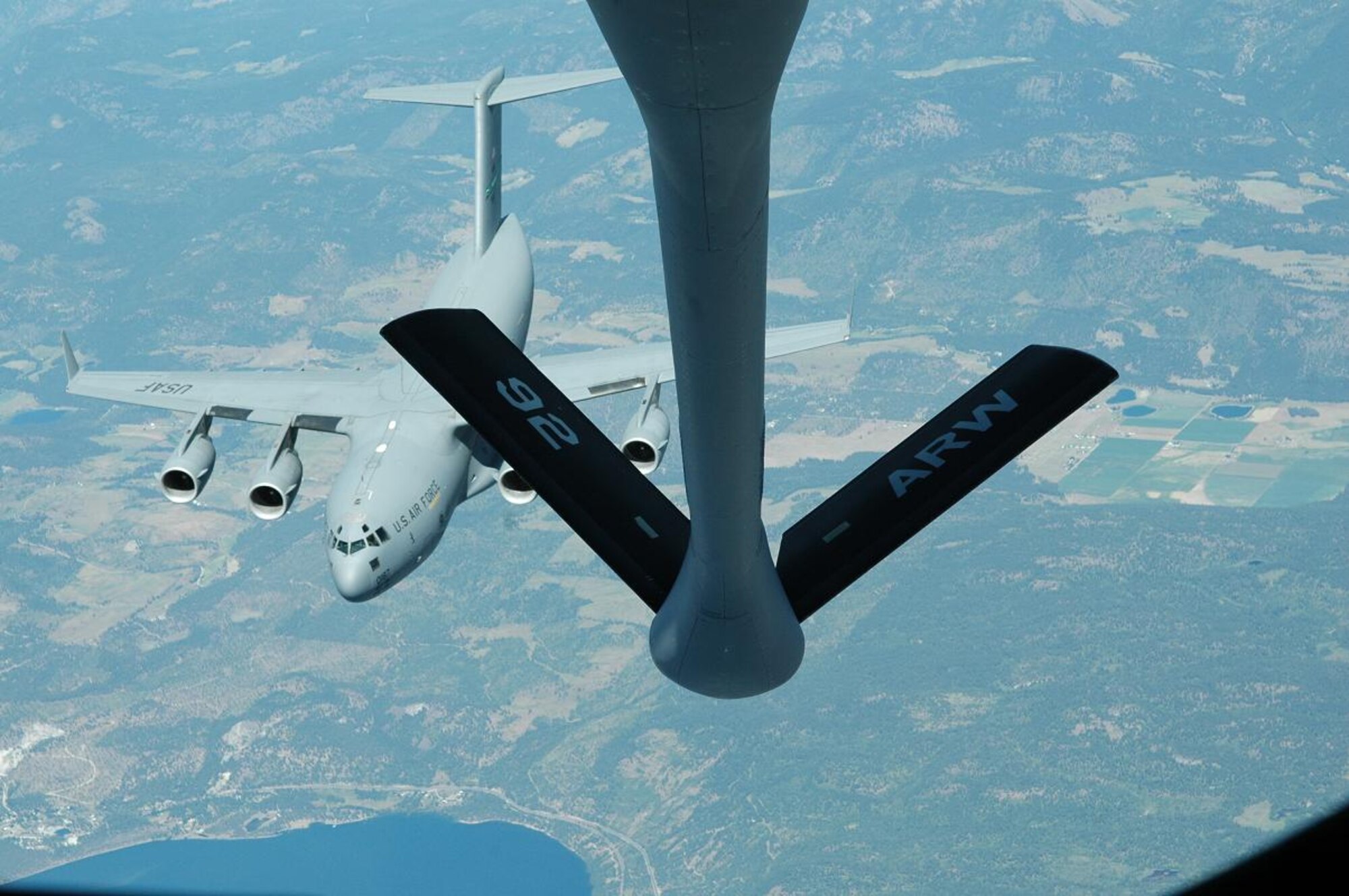 MOSES LAKE,, Wash. – A Fairchild KC-135 Stratotanker prepares to refuel a C-17 Globemaster III from McChord Air Force Base, Wash. Tuesday afternoon’s training sortie over north-central Washington was in preparation for the Air Mobility Command Rodeo 2007 to be held at McChord, July 21-28. (U.S. Air Force photo/1st Lt. Tristan Hinderliter)