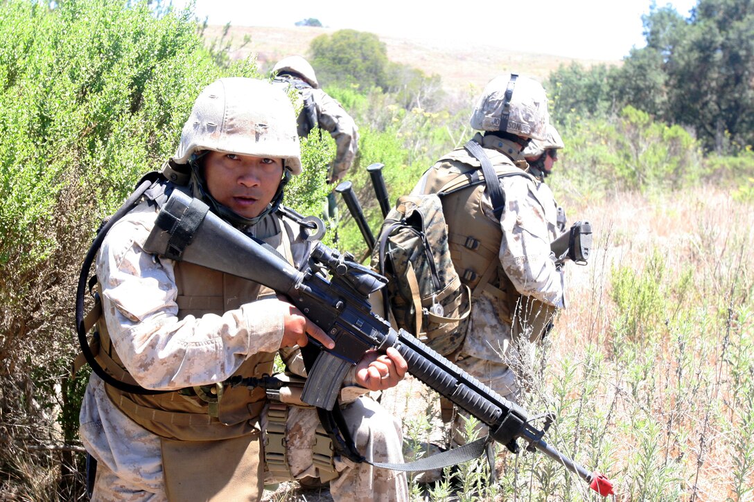 MARINE CORPS BASE CAMP PENDLETON, Calif., (July 11, 2007) ? Marines with Alpha Company, Battalion Landing Team 1st Battalion, 5th Marine Regiment, 11th Marine Expeditionary Unit conducted a raid on a mock terrorist training camp, here. Marines with the BLT conducted three separate motor raids on different objectives from July 9-13 as part of their pre-deployment training. The raid force captured hostile combatants, seized small arms weapon caches, improvised explosive devices and rocket-propelled grenades. The raid training, which is administered by Special Operations Training Group, I Marine Expeditionary Force, offers elements of the BLT an opportunity to train together and build standard operating procedures that will be used when they deploy later this year.