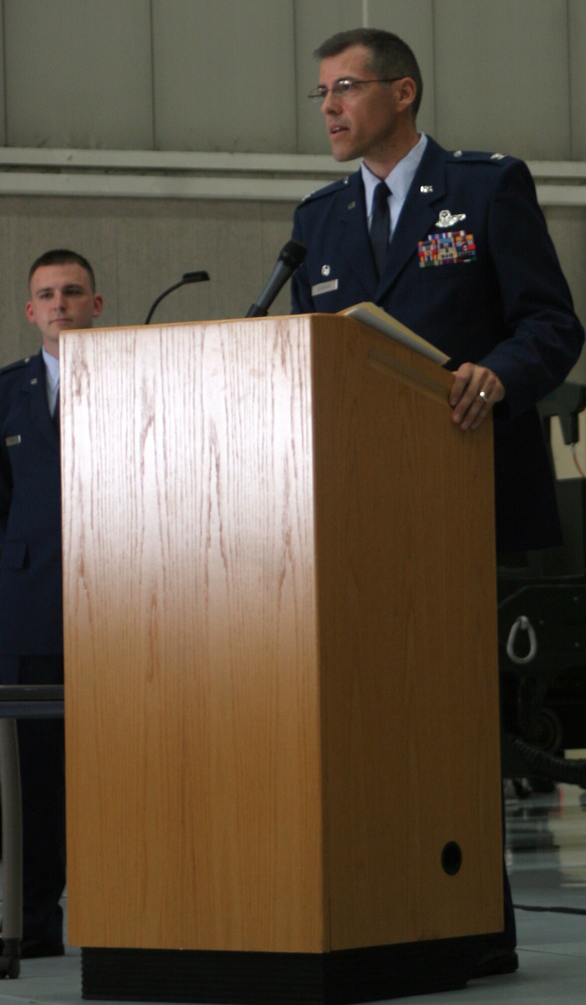 Col. Thomas Bussiere, 509th Operations Group commander, addresses the 509th OG during the OG change of command 9 July. (U.S. Air Force photo/Airman 1st Class Stephen Linch) 