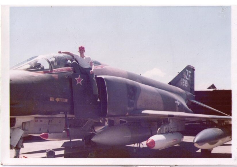 Master Sgt. Bill Pook, then a 19-year-old Airman, poses next to an F-4 Phantom at Udorn Air Base, Thailand, in 1972. Sergeant Pook entered the Air Force in 1971 and served two deployments to Thailand in support of Operation Linebacker. He left the Air Force after one enlistment then reentered in 1990 in support of Operation Desert Shield. The Vietnam veteran said the quality of Airmen and technology are the two biggest differences between the Air Force that was and the Air Force that is. (File photo)