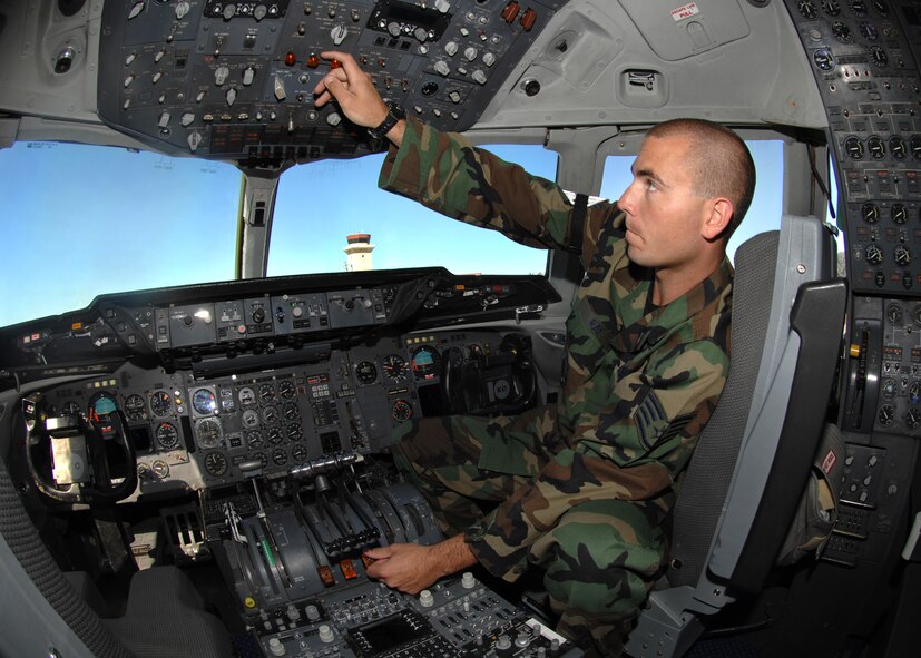 Staff Sgt. Travis Ray, 660th Aircraft Maintenance Squadron KC-10 crew chief, tests the engine run components on a KC-10 Extender for correct system operation. (U.S. Air Force photo/Nan Wylie)