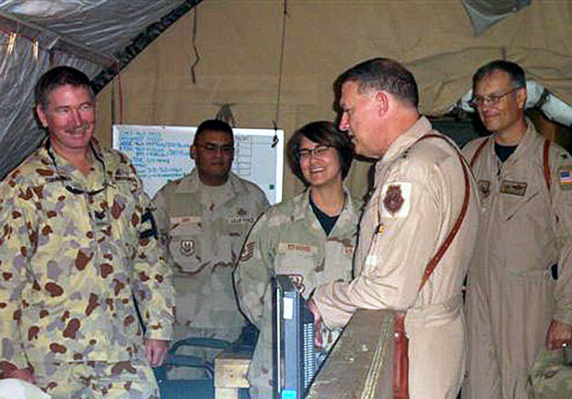 Lt. Gen. Gary L. North, commander of U.S. Central Command Air Forces visited servicemembers of the 451st Air Expeditionary Group and Bulgarian forces at Kandahar Airfield, Afghanistan July 7.  (U.S. Air Force photo by Tech. Sgt. Jennifer Evans)