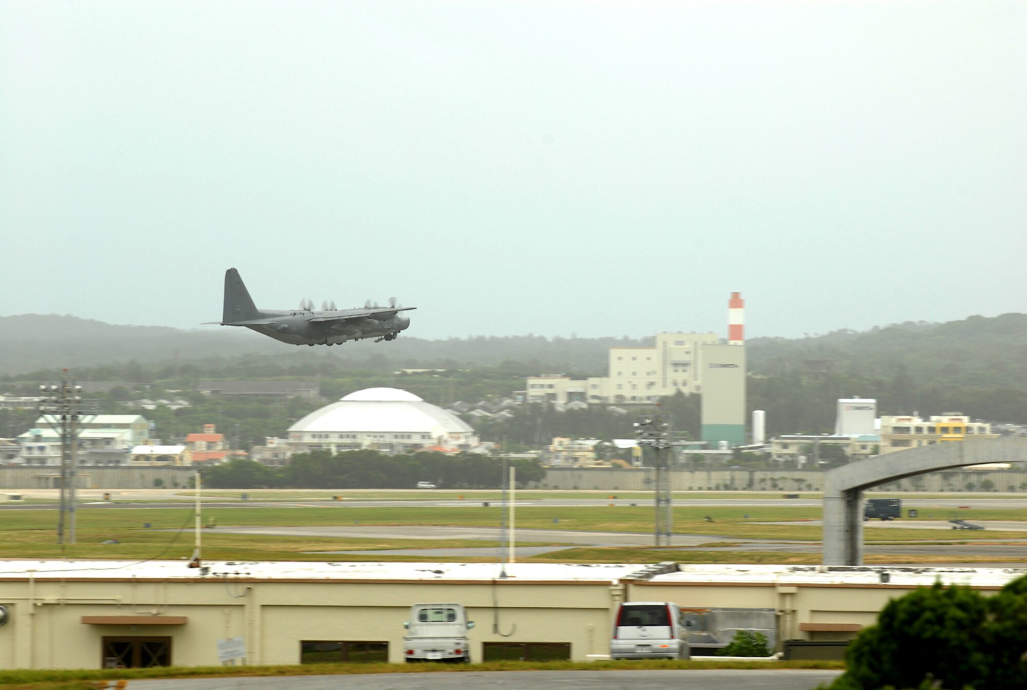 A 353rd Special Operations Group MC-130 departs Kadena Air Base, Japan, July 12, 2007, enroute to another base in the Pacific as part of the base's typhoon evacuation.  In preparation for Typhoon Man-Yi, base aircraft are either being evacuated or placed in hangars and protective aircraft shelters. Typhoon Man-Yi, the first typhoon of the year for Okinawa, is expected to make landfall Friday at Kadena. U.S. Air Force photo/Airman 1st Class Kelly Timney
