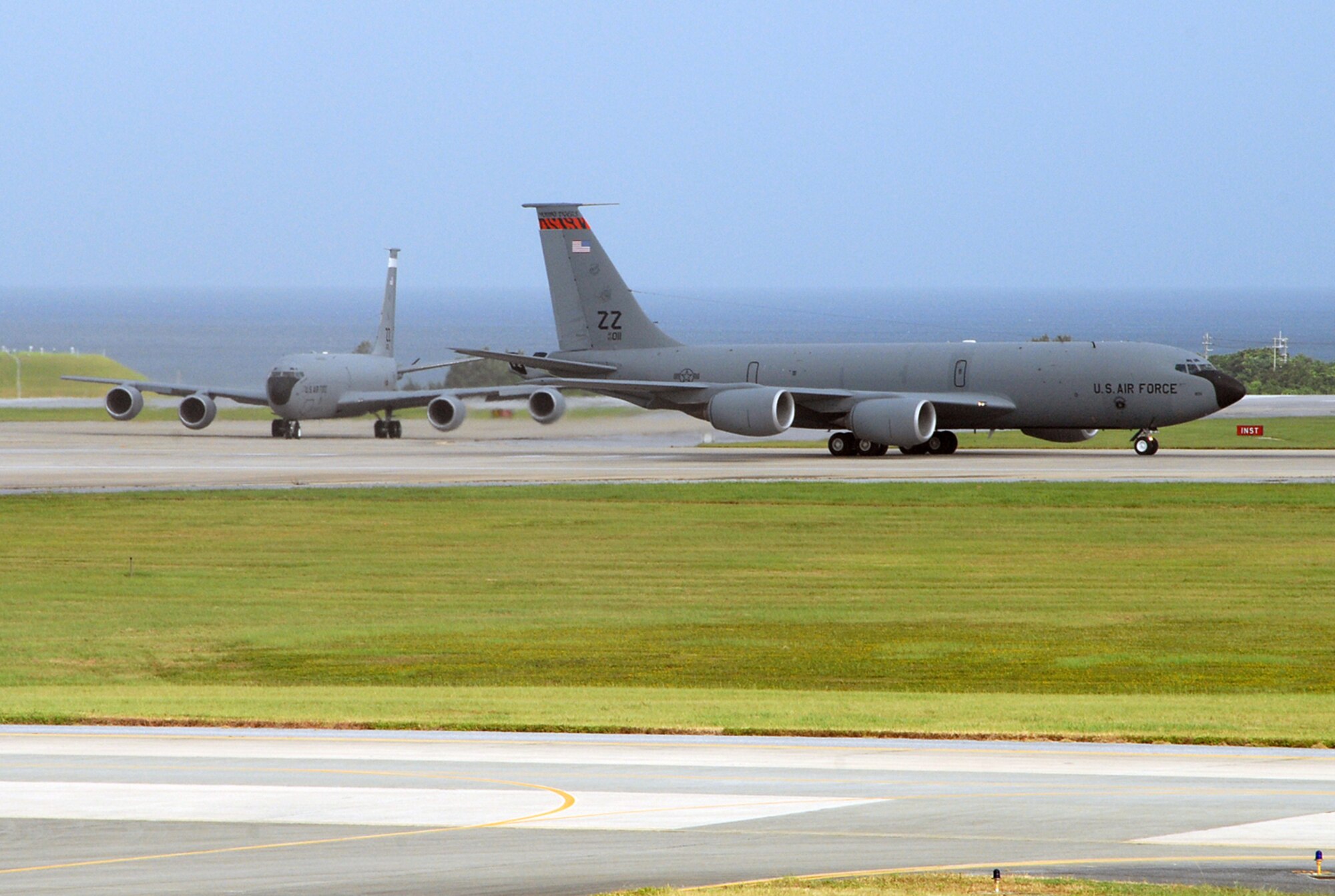 KC-135 Stratotankers from the 909th Air Refueling Squadron depart Kadena Air Base, Japan, July 12, 2007, enroute to Anderson Air Force Base, Guam as part of the base's typhoon evacuation.  In preparation for Typhoon Man-Yi, the majority of KC-135 aircraft assigned to the base are being evacuated. Typhoon Man-Yi, the first typhoon of the year for Okinawa, is expected to make landfall Friday at Kadena.  U.S. photo/Staff Sgt. Steven Nabor