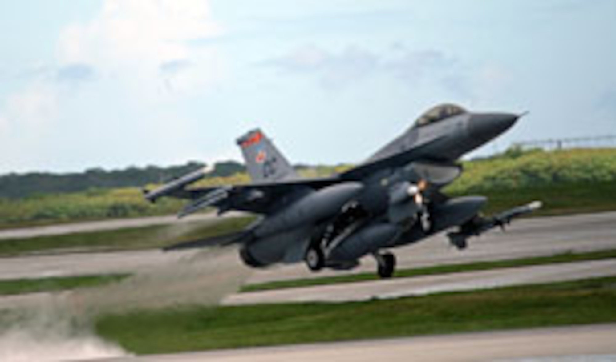ANDERSEN AIR FORCE BASE, Guam -- An F-16 from the 522d Expeditionary Fighter Squadron takes off during a routine training mission. The current deployment of aircraft at Guam is one of the largest footprints in the history of the buildup of air forces here, maintaining U.S. deterrence and warfighting capabilities against possible threats in Asia. (U.S. Air Force photo by Senior Master Sgt. Mahmoud Rasoulyan)