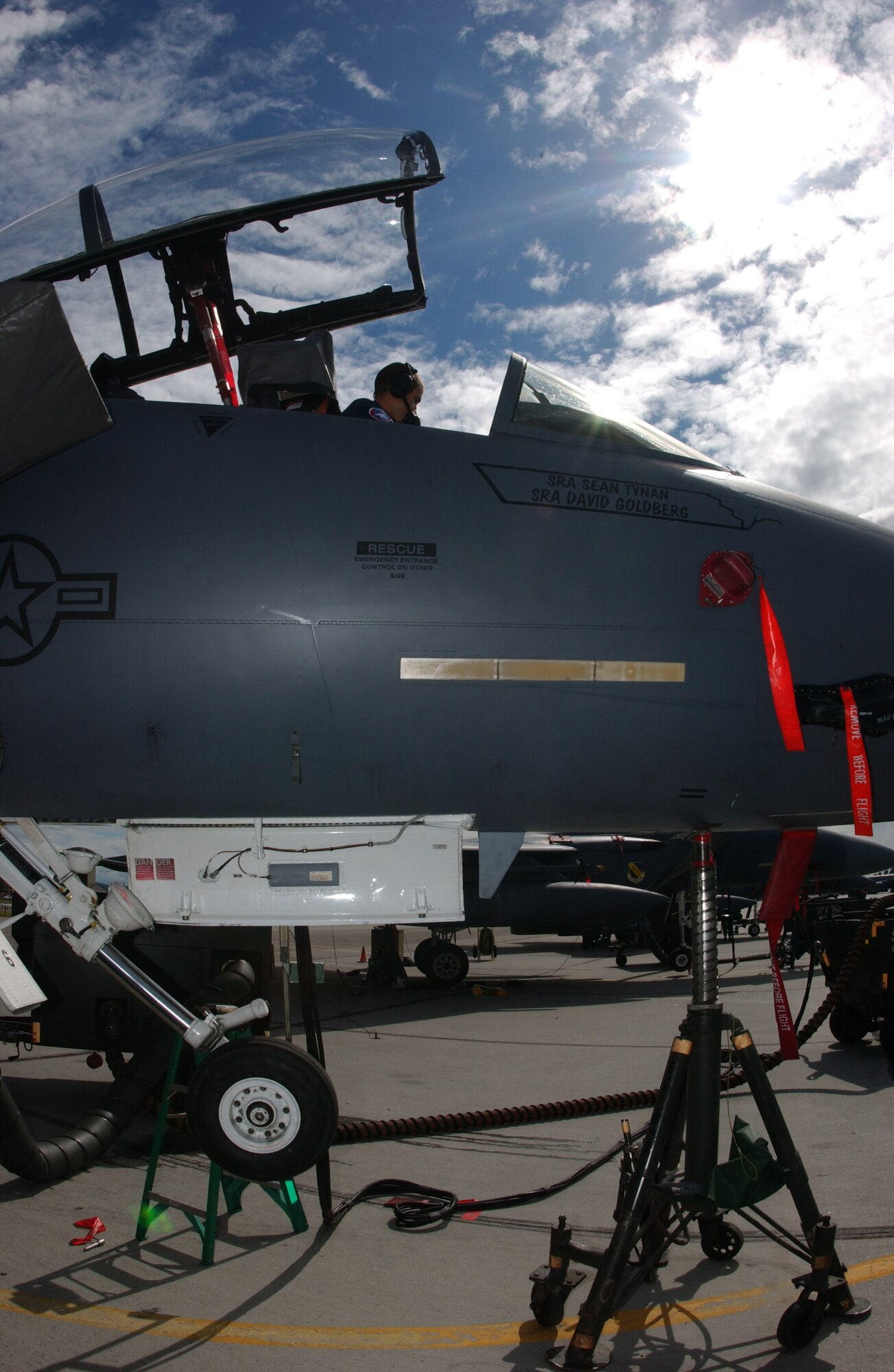 EIELSON AIR FORCE BASE, Alaska -- Airman 1st Class Harrison McMillan, 335th Aircraft Maintenance Unit, Seymour Johnson Air Force Base, N.C., performs a "jack-retract" on a F-15E Strike Eagle which is a process used to trouble-shoot the landing gear July 12.  Red Flag-Alaska 07-3 is a Pacific Air Forces-directed field training exercise for U.S. and coalition forces flown under simulated air-combat conditions. It is conducted on the Pacific Alaska Range Complex with air operations flown out of Eielson and Elmendorf Air Force Bases. (U.S. Air Force Photo by Airman 1st Class Jonathan Snyder)
