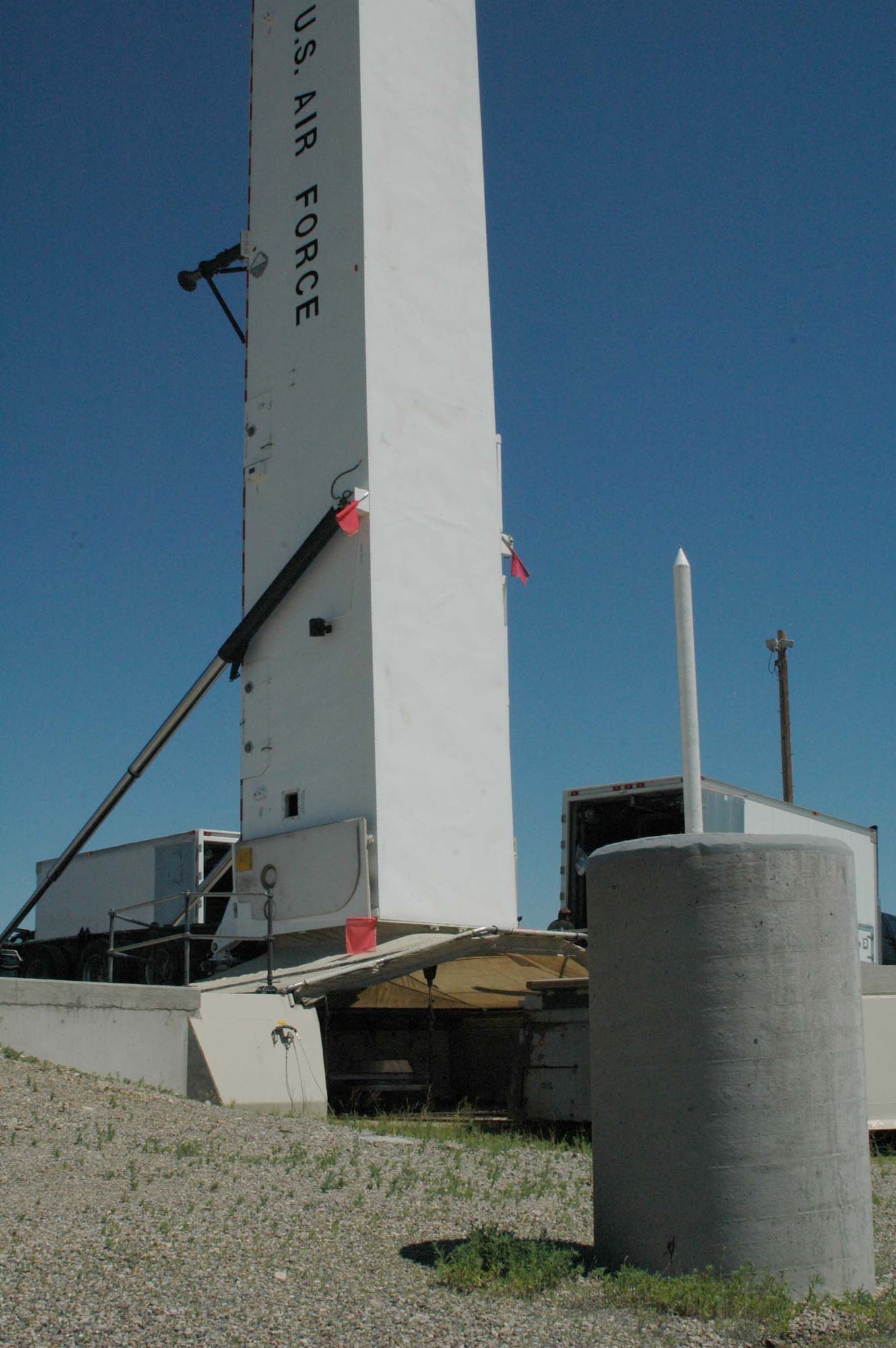 The downstage of the Minuteman III missile located at this launch facility near Brady, Mont. is lifted into the transporter-erector July 12.  This mission completed the first missile removal and marked the start of Defense Department-directed deactivation activities in the 564th Missile Squadron at Malmstrom Air Force Base, Mont.  (U.S. Air Force photo/Valerie Mullett)