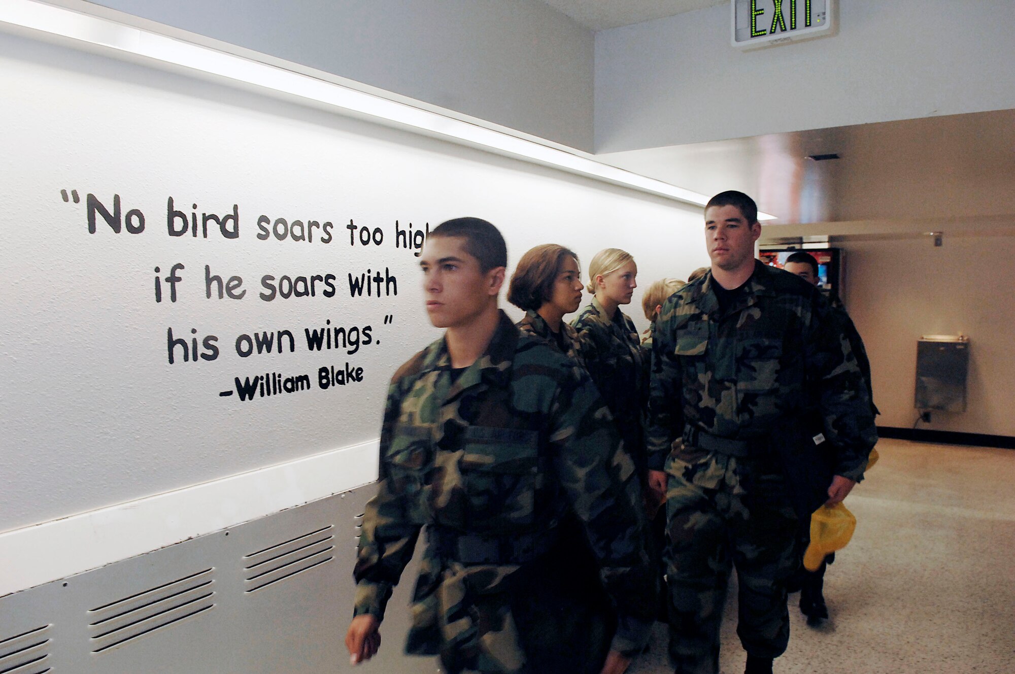 Several new cadets head to their rooms before breakfast July 12 at the Air Force Academy in Colorado Springs, Colo.  The Class of 2011 has the largest percentage of women entering basic cadet training in the Academy's history.  The Academy received 9,162 applications for this year's class. Only 1,600 applicants were offered appointments. (U.S. Air Force photo/Tech. Sgt. Larry A. Simmons)