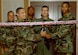 Col. Mark Barrett, 1st Fighter Wing commander, along with 1st FW Airmen, cuts the ribbon during the reopening of the Bayside Enlisted Club July 13. The $4.9 million repair project began after Hurricane Isabel stormed through Langley Sept. 18, 2003. (U.S. Air Force Photo/Senior Airman Tabitha Kuykendall)