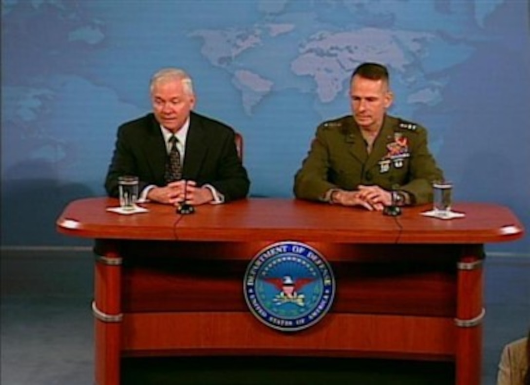 Defense Secretary Robert M. Gates and Chairman of the Joint Chiefs of Staff U.S. Marine Gen. Peter Pace conduct a media roundtable at the Pentagon, July 13, 2007.