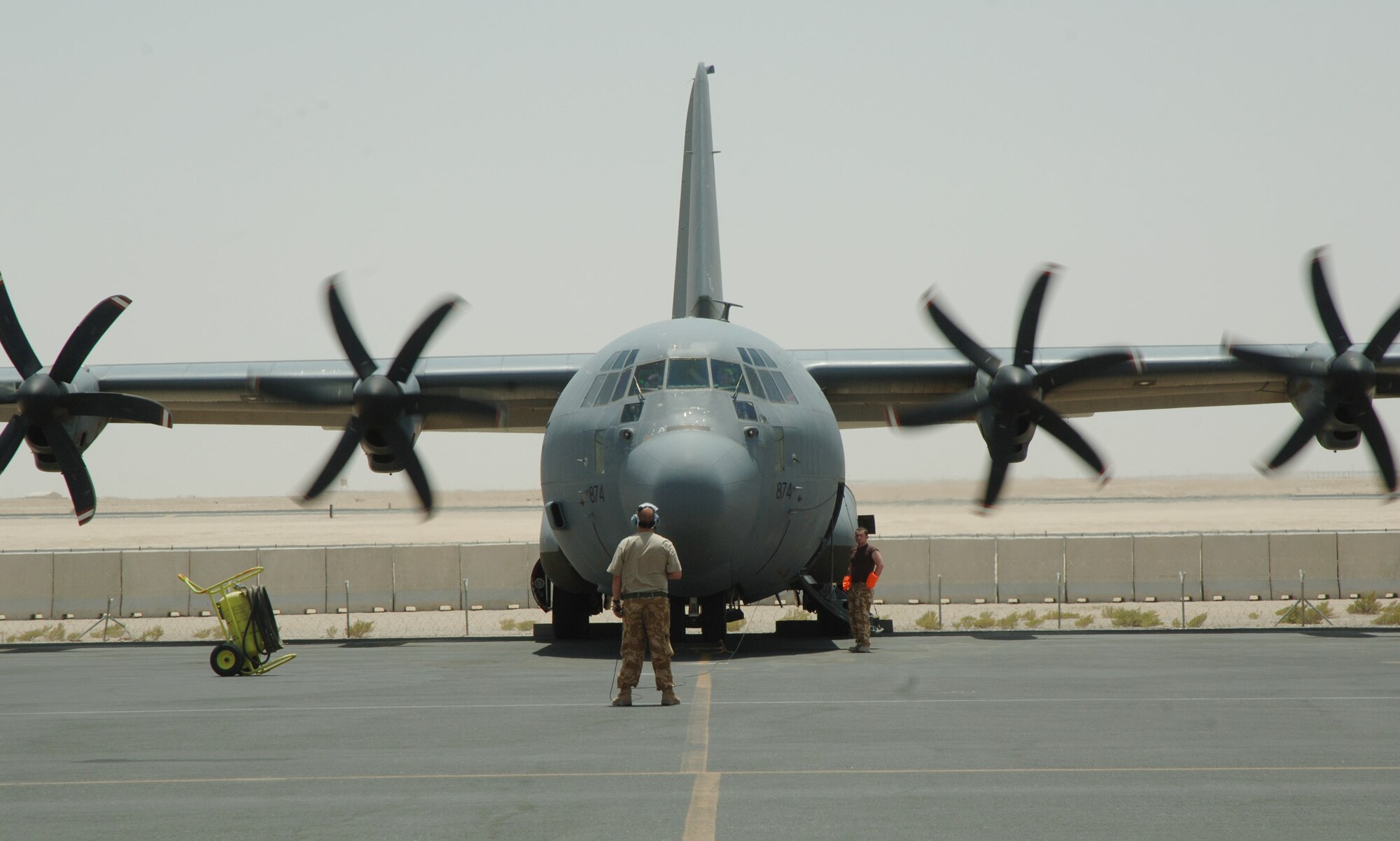 An Air Force C-130 taxies to a stop at a base in Southwest Asia after an airlift mission in the area of responsibility.  Coalition C-130s and C-17s flew 153 airlift sorties recently and offloaded 717 tons of cargo. (U.S. Air Force photo/Master Sgt. Ken Stephens)
