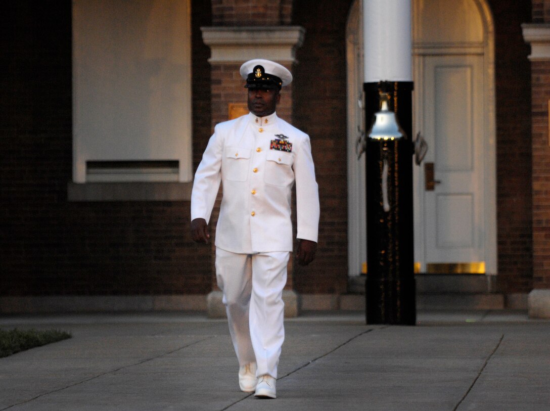 Purple Heart recipient Navy Senior Chief David L. Hall is introduced during the evening parade hosted by Chairman of the Joint Chiefs of Staff U.S. Marine Gen. Peter Pace at the Marine Corps Barracks in Washington, D.C., July 13, 2007.