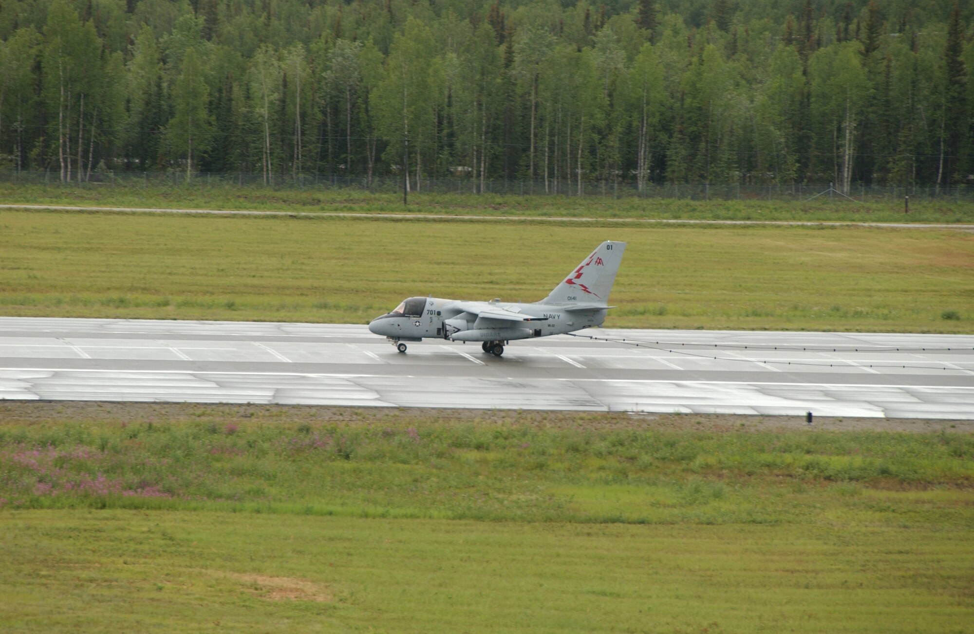 EIELSON AIR FORCE BASE, Alaska -- A Navy C-9 uses its hook to catch the arresting cable on Eielson AFB flight line July 11, 2007. Red Flag-Alaska is an exercise used to sharpen air combat skills by flying ten simulated combat sorties in a realistic threat environment. But safety is something that is never taken lightly when it comes to the Airman and Aircraft.  (U.S. Air Force photo by Airman 1st Class Christopher Griffin)