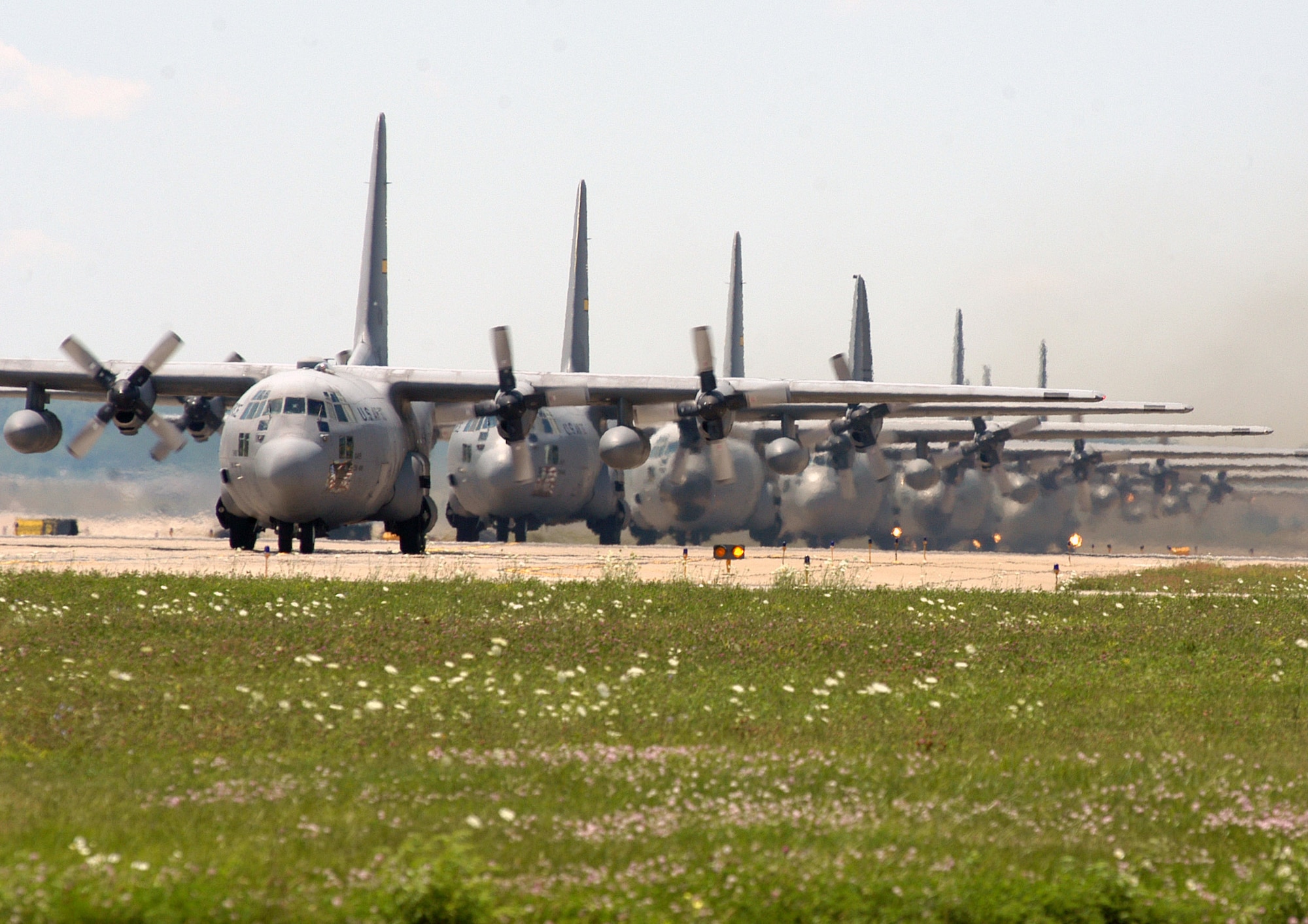 Eight C-130 Hercules aircraft from the Air Force Reserve Command's 911th Airlift Wing return home to Pittsburgh Air Reserve Station, Pa., after participating in Exercise Bold Effort July 14.  The purpose of this training exercise was to maintain unit proficiency in re-supplying ground forces during combat operations.  (U.S. Air Force photo/Senior Airman Jamie Perry)