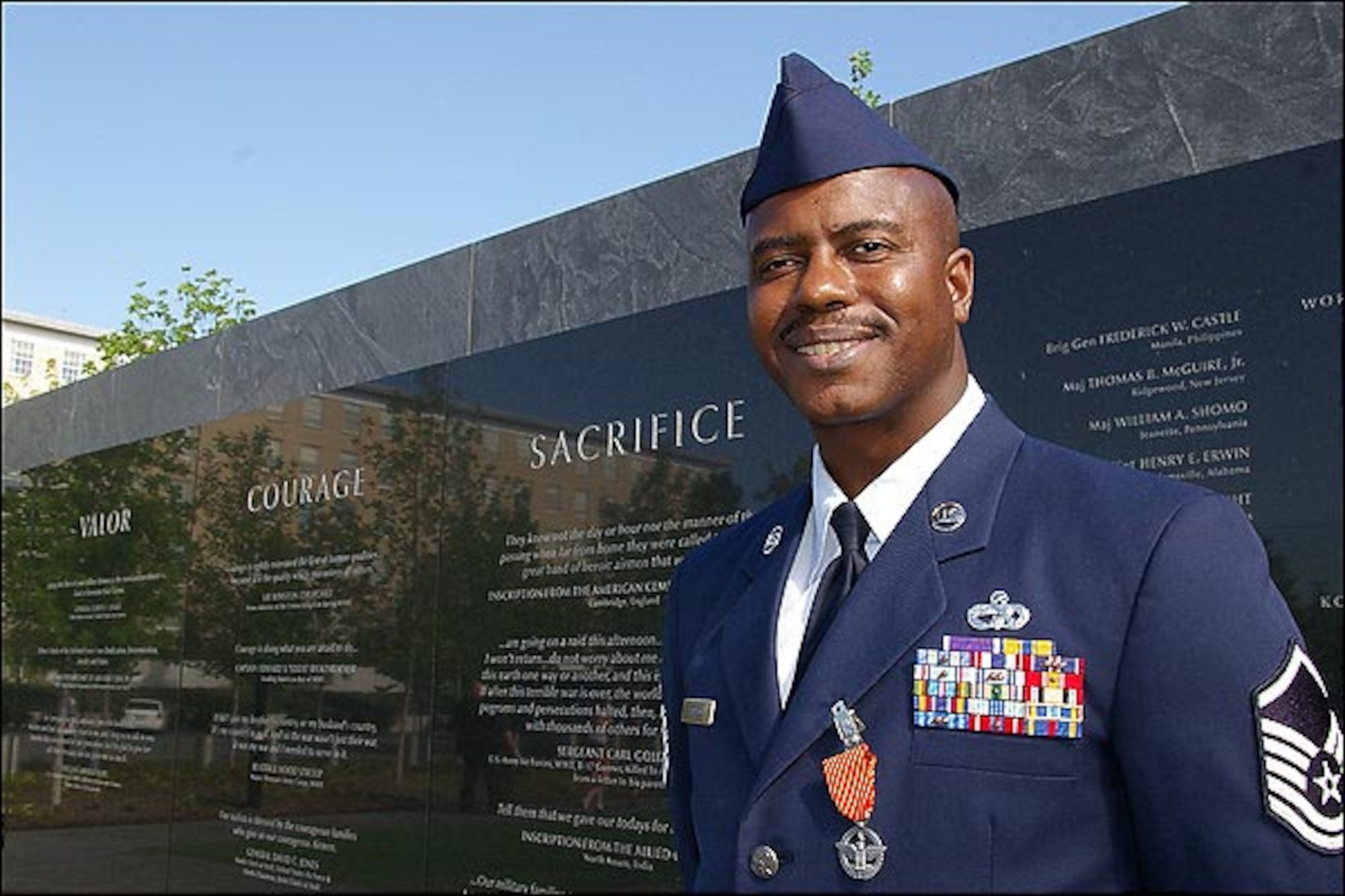 Master Sgt. Charlie Peterson, a member of the 927th Logistics Readiness Squadron, stands at the Air Force Memorial in Washington, D.C., following a ceremony where he was awarded the Air Force Combat Action Medal. Sergeant Peterson is the first Air Force Reservist to receive the medal. (U.S. Air Force photo by Donna Perry)