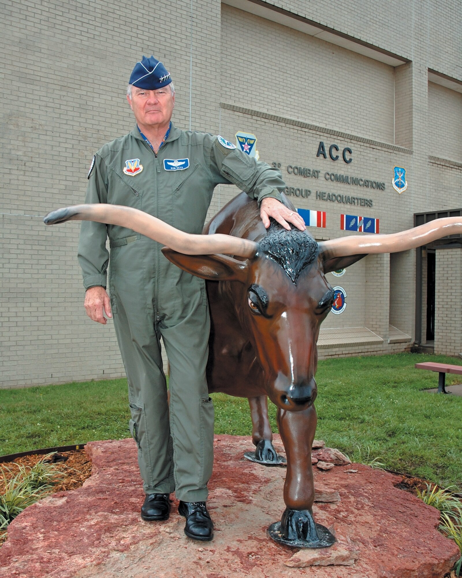 During a visit to the 3rd Combat Communications Group compound, Gen. Ronald Keys, commander of Air Combat Command, was the first to have his photo taken with the new mascot, Buford. (Air Force photo by 2nd Lt. Gary Priest)