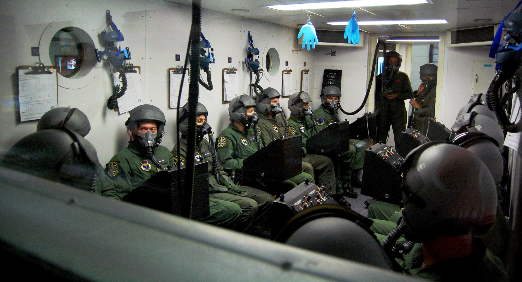 LAUGHLIN AIR FORCE BASE, Texas – Students in Specialized Undergraduate Pilot Training class 08-12 learn what it’s like to breath oxygen for an extended period of time in the altitude chamber at Laughlin’s aerospace physiology flight. (U.S. Air Force photo by Staff Sgt. Austin M. May)