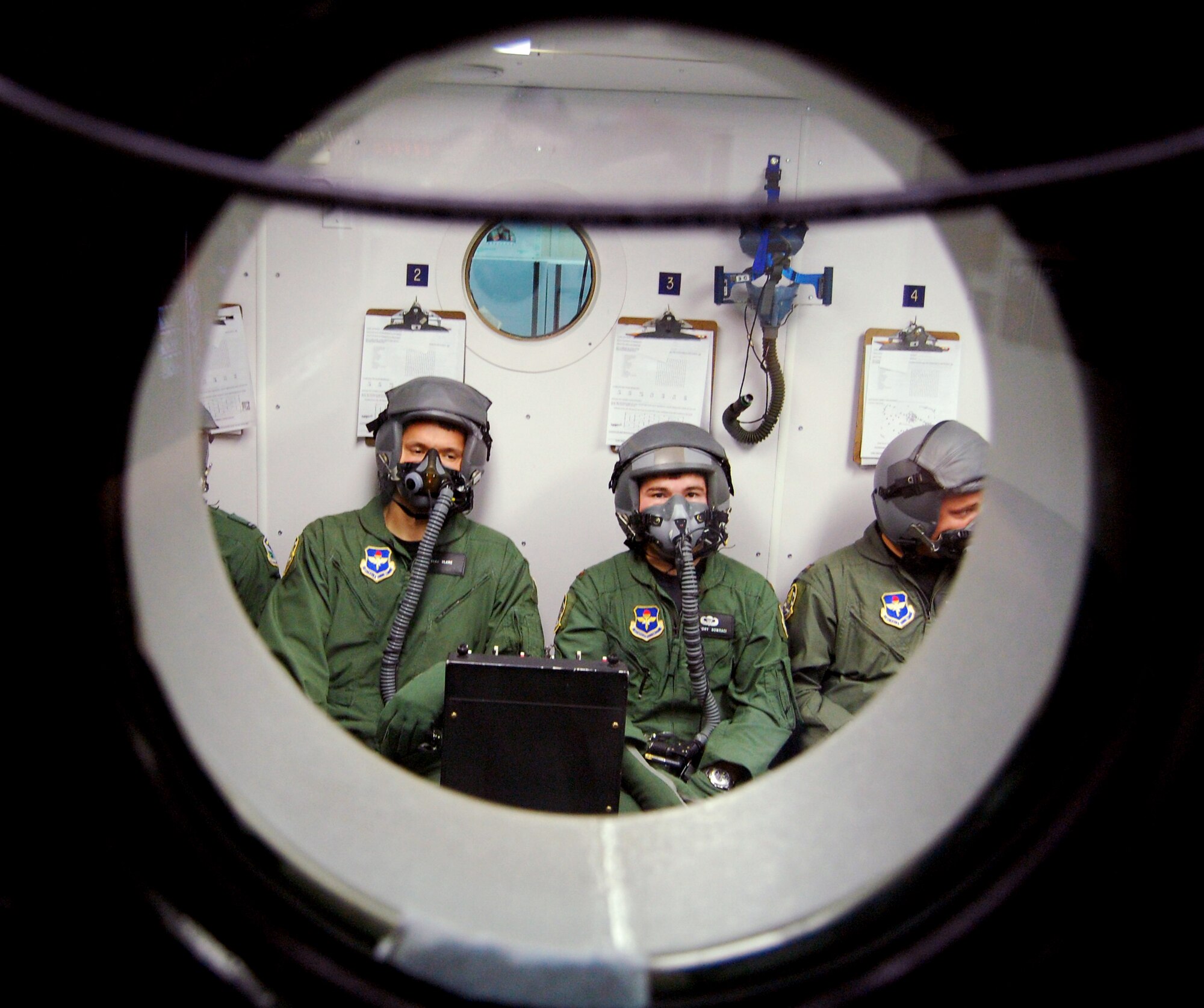 LAUGHLIN AIR FORCE BASE, Texas – Students in Specialized Undergraduate Pilot Training class 08-12 learn what it’s like to breath oxygen for an extended period of time in the altitude chamber at Laughlin’s aerospace physiology flight. (U.S. Air Force photo by Staff Sgt. Austin M. May)