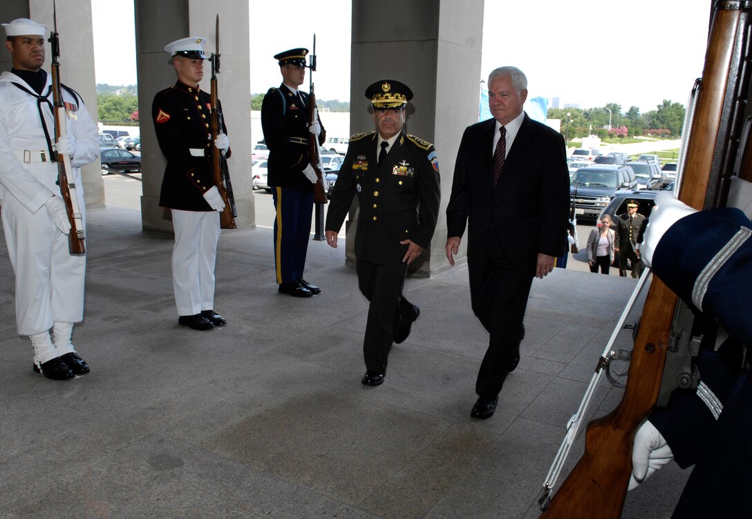 Defense Secretary Robert M. Gates (right) escorts Guatemalan Minister of Defense Maj. Gen. Ronaldo Cecilo Leiva upon his arrival at the Pentagon, July 16, 2007.  