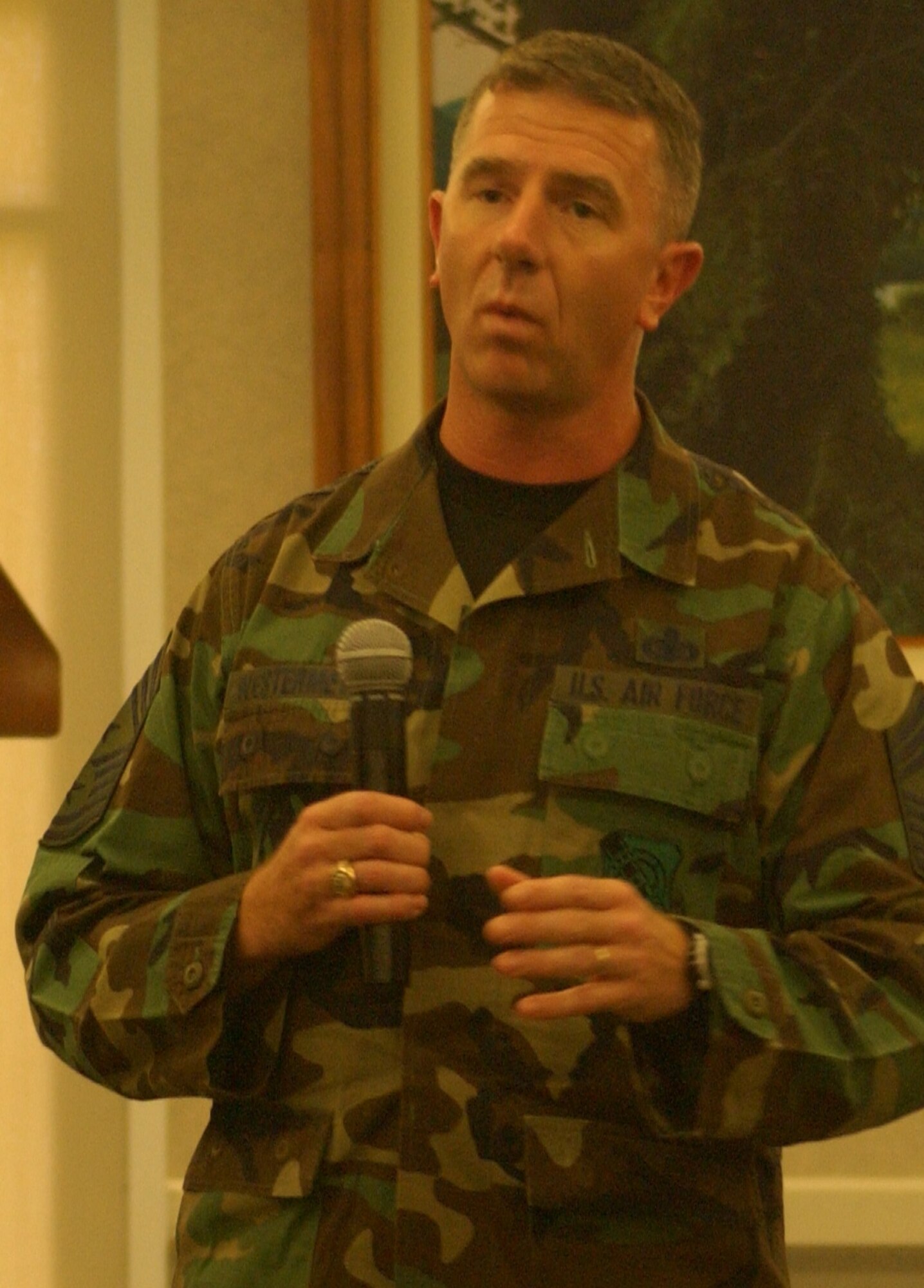Chief Master Sgt.Tom Westermeyer, 15th Airlift Wing Command Chief speaks to Hickam Airmen during a 15th AW enlisted call. Photo by Senior Airman Erin Smith