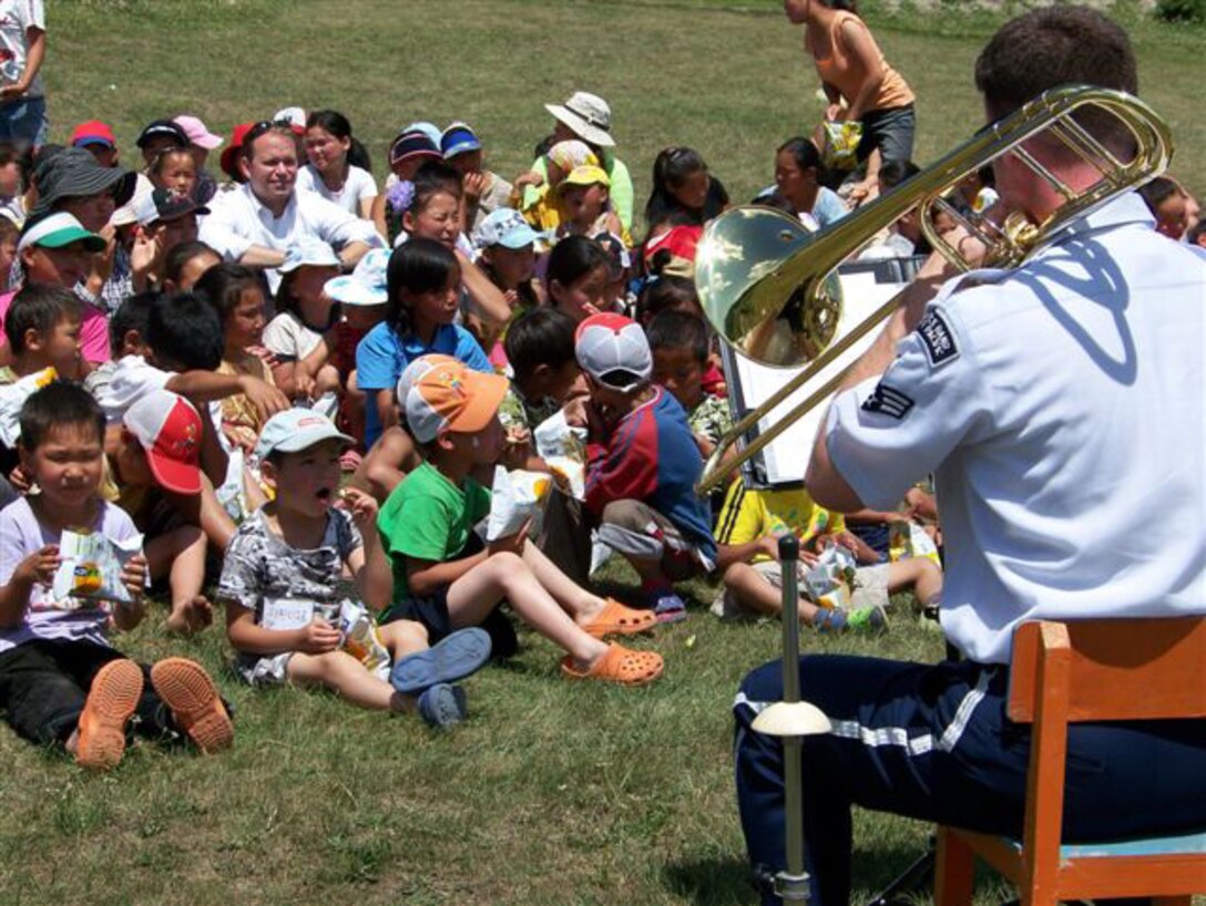 ULAANBATAAR, Mongolia -- The USAF Band of the Pacific-Asia performs at an orphanage July 5. (Courtesy USAF photo)